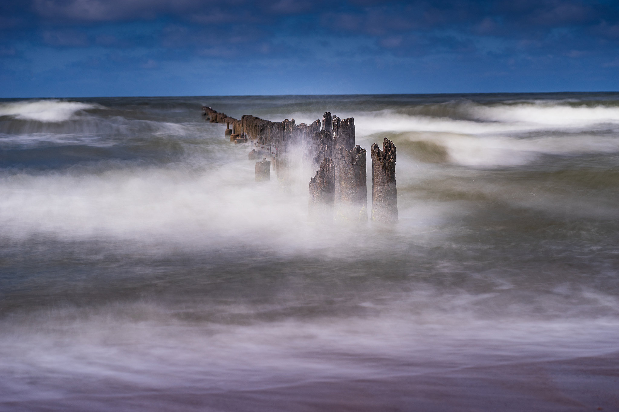 old harbor ruins. blue sea and port. harbour in baltic sea, latv