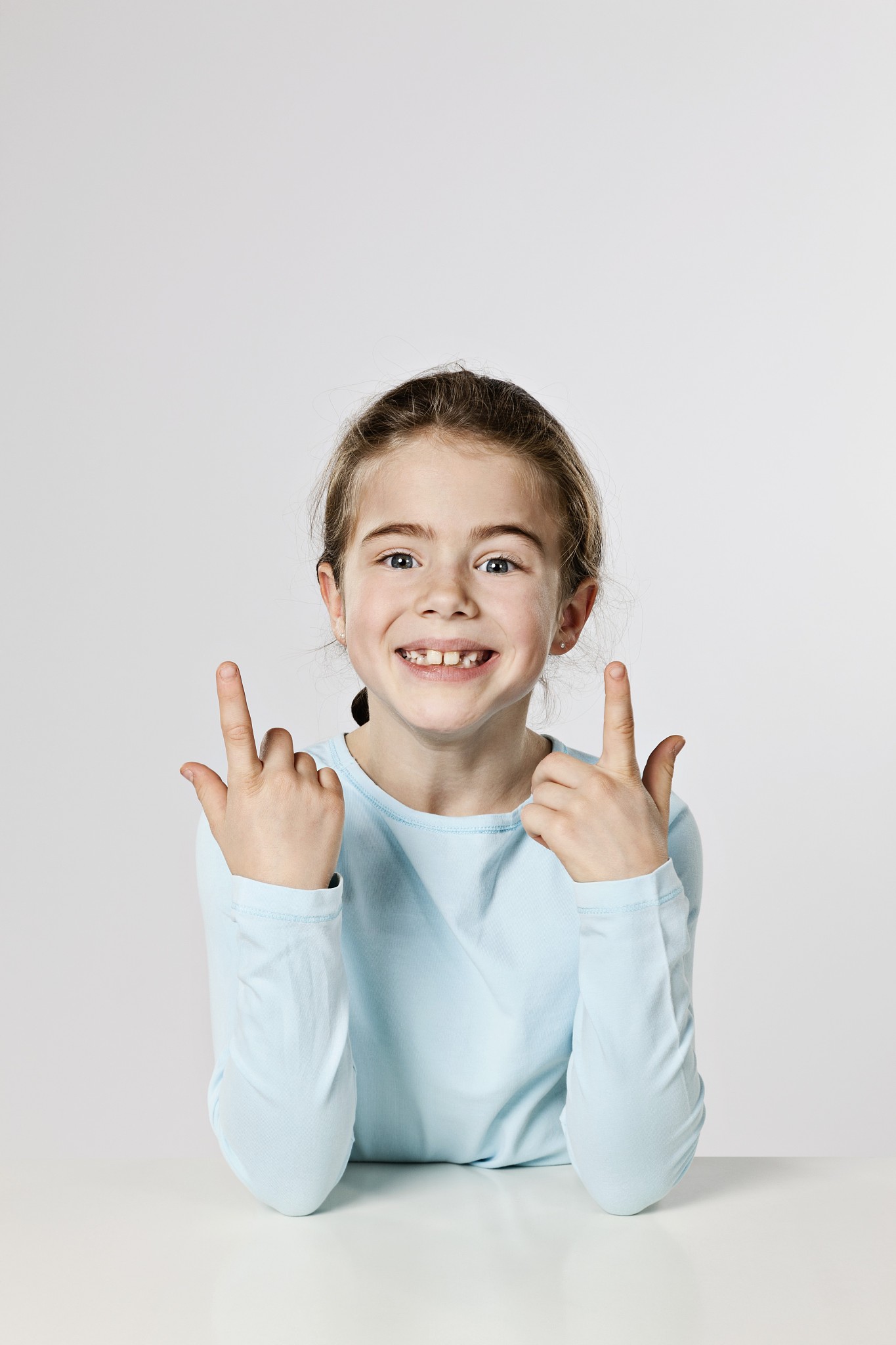 portrait of girl in blue blouse