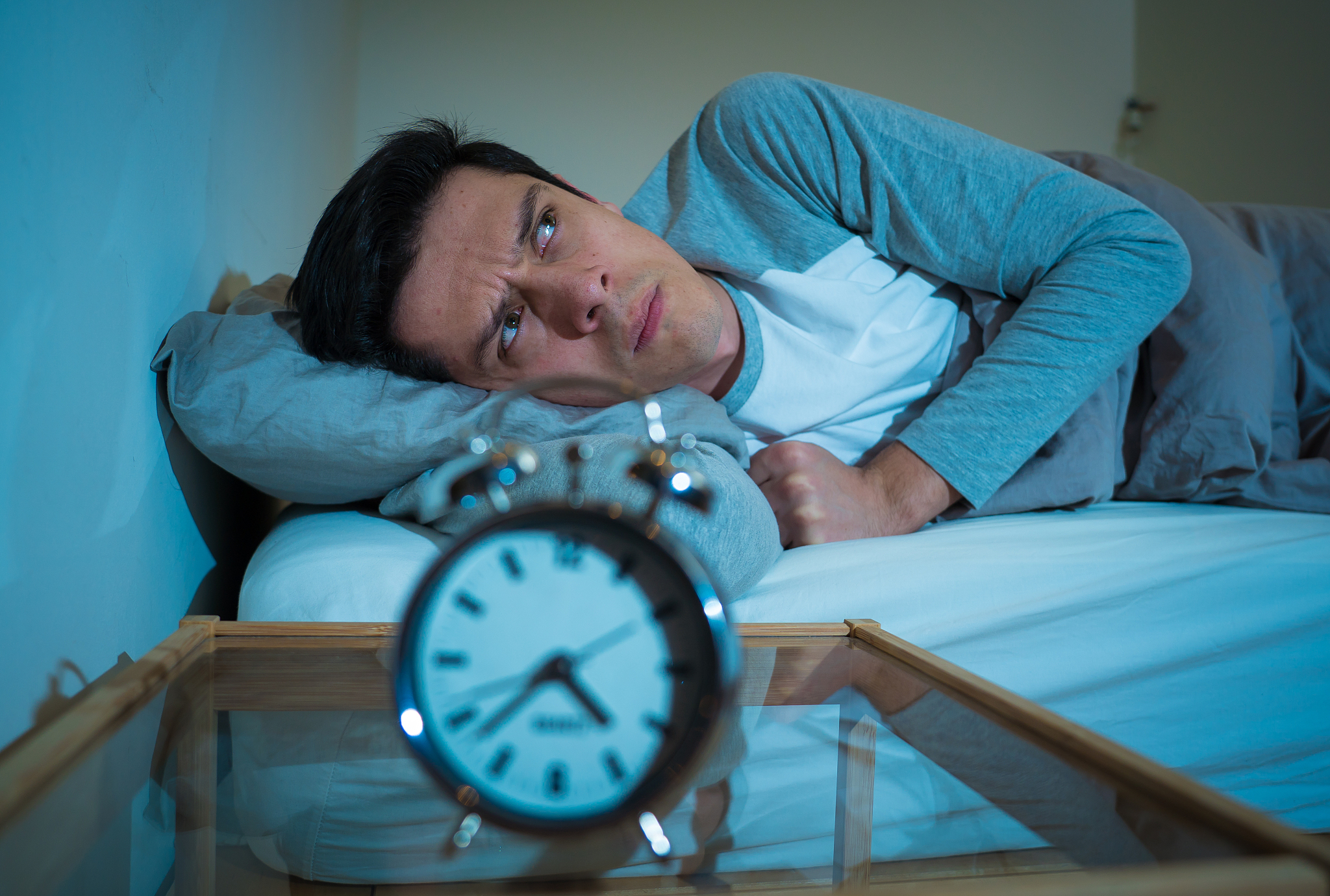 sleepless and desperate young caucasian man awake at night not a