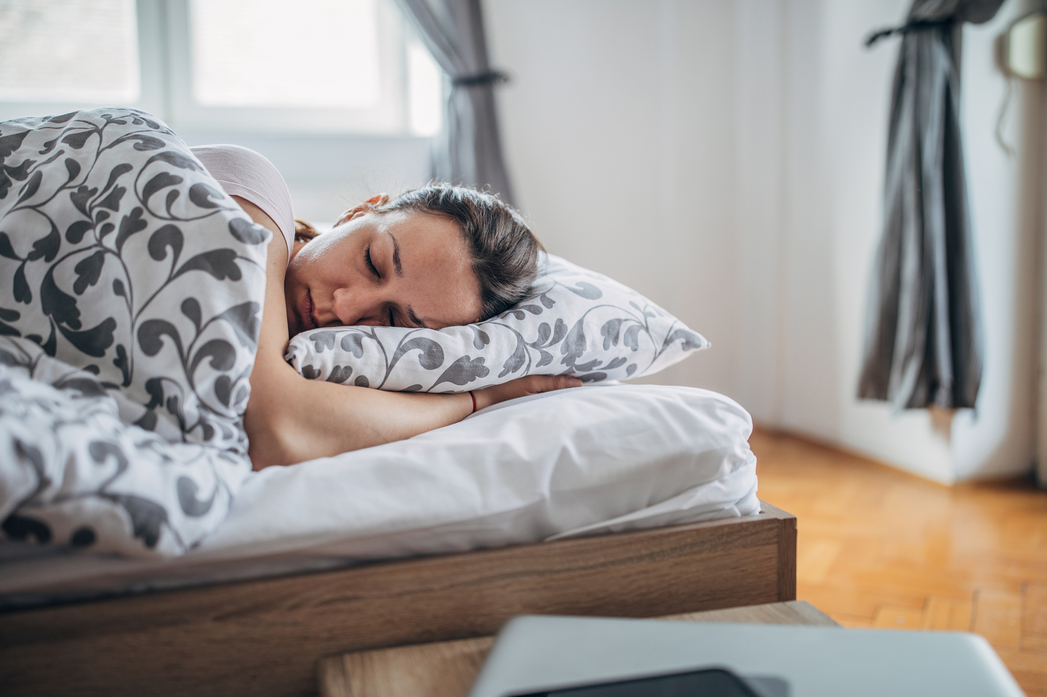 woman sleeping in her bed