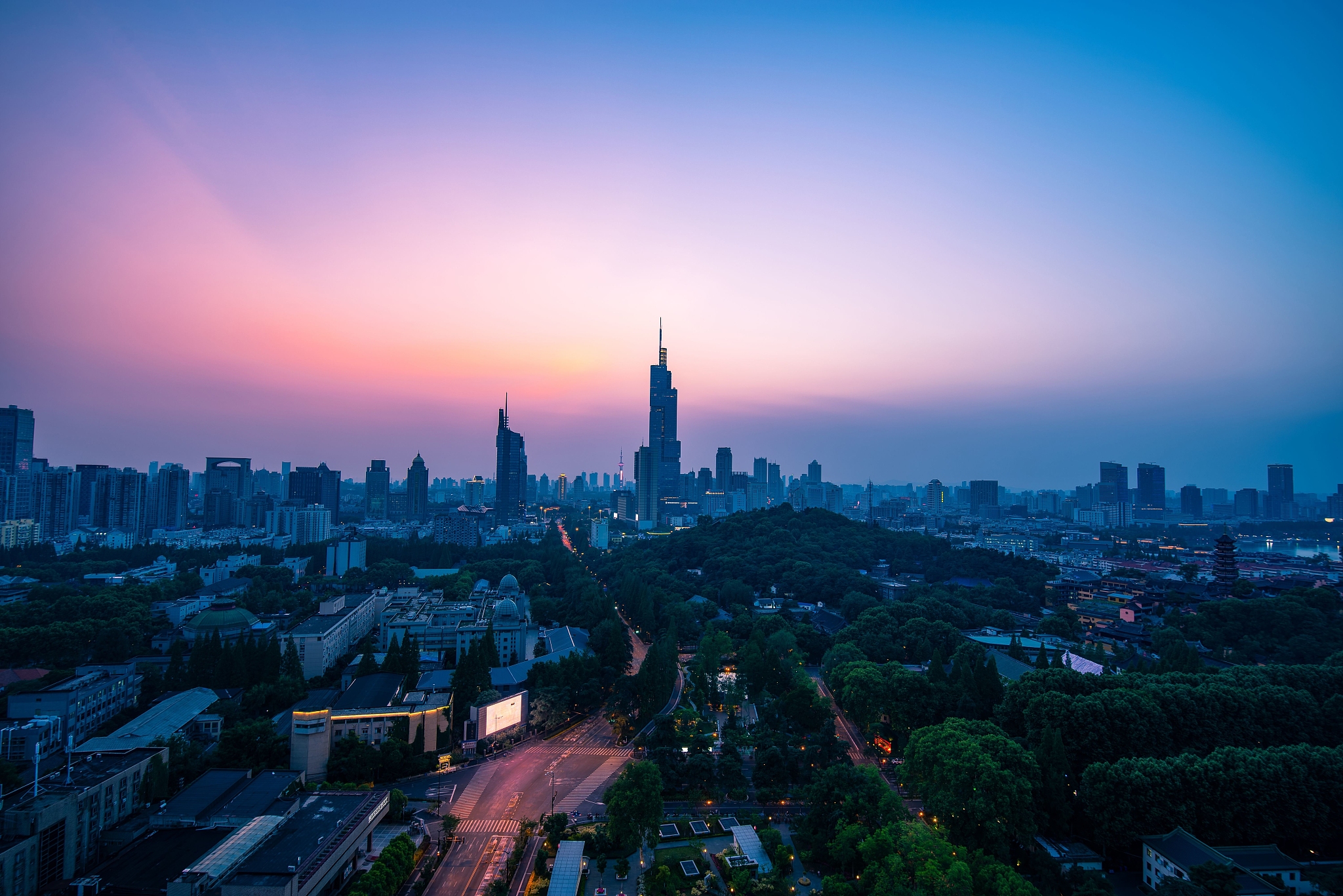 aerial view of city buildings during sunset