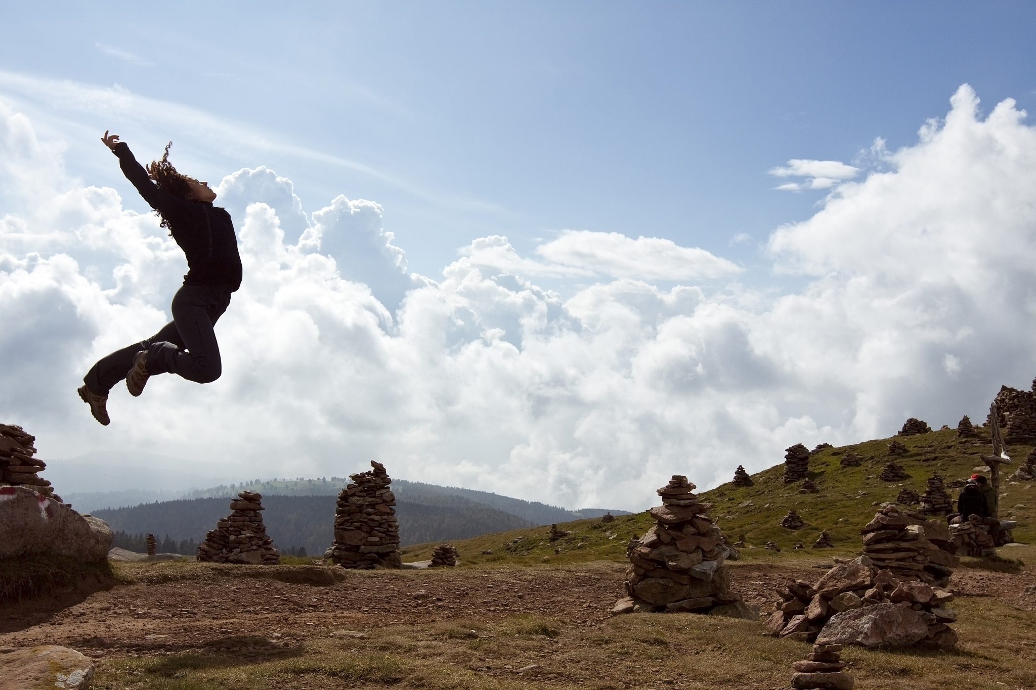 Flying kiss theme ride in the Wulong Baima mountains in China the ride stands as two giant statues overlooking a 3000 foot cliff with rotating observations decks with spectacular views