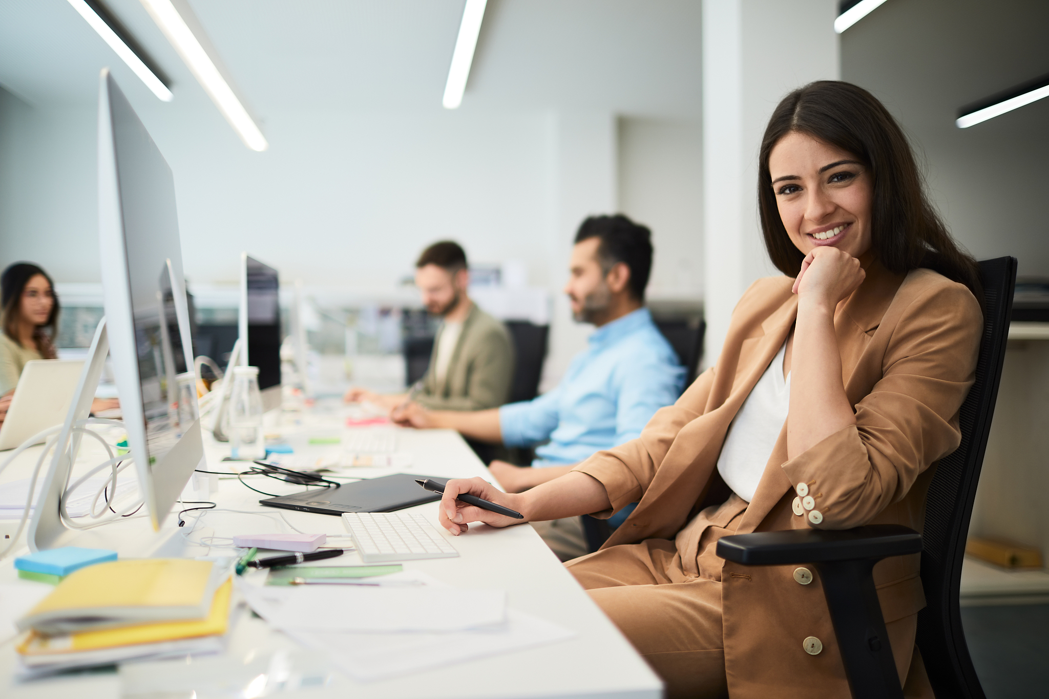businesswoman looking at camera.