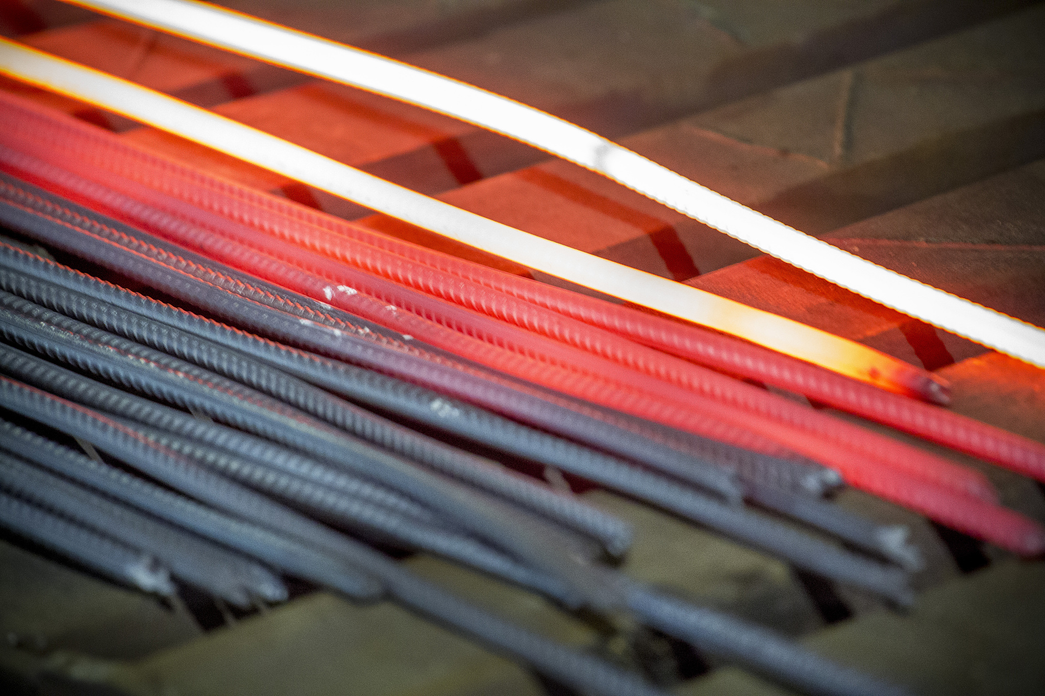 heated metal pig gets squeezed and drilled at special metal forg