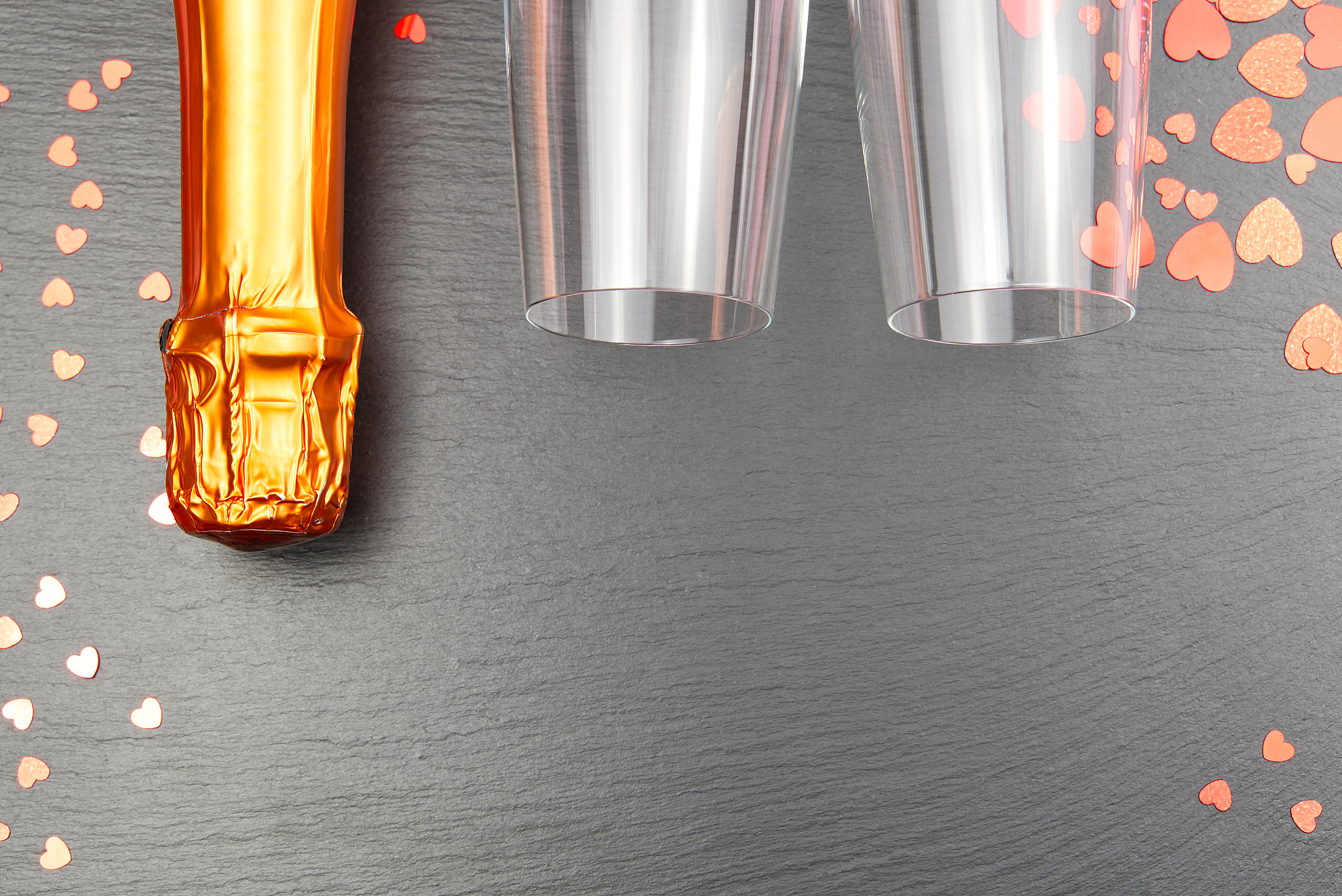 two glasses of white champagne on black background. festive roma