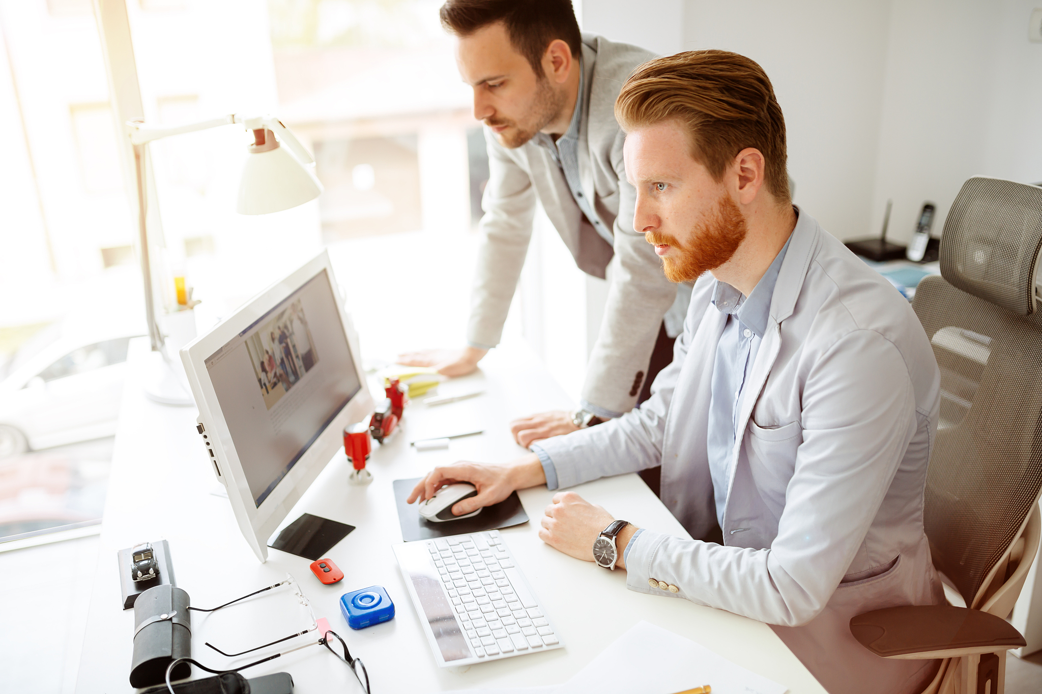 coworkers working on project together