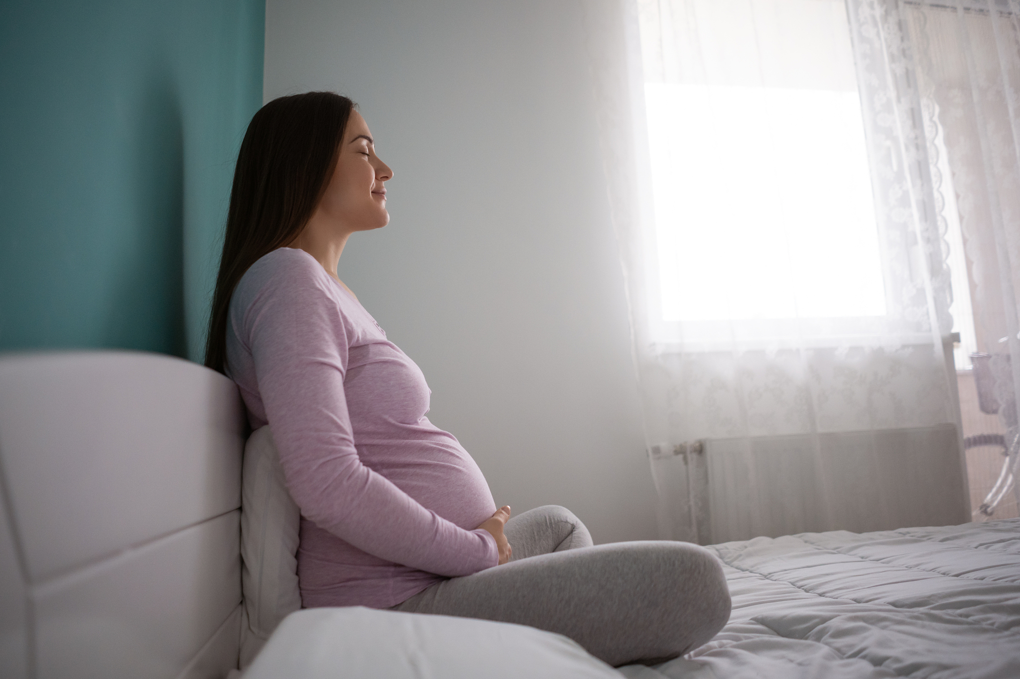 pregnant woman at home.