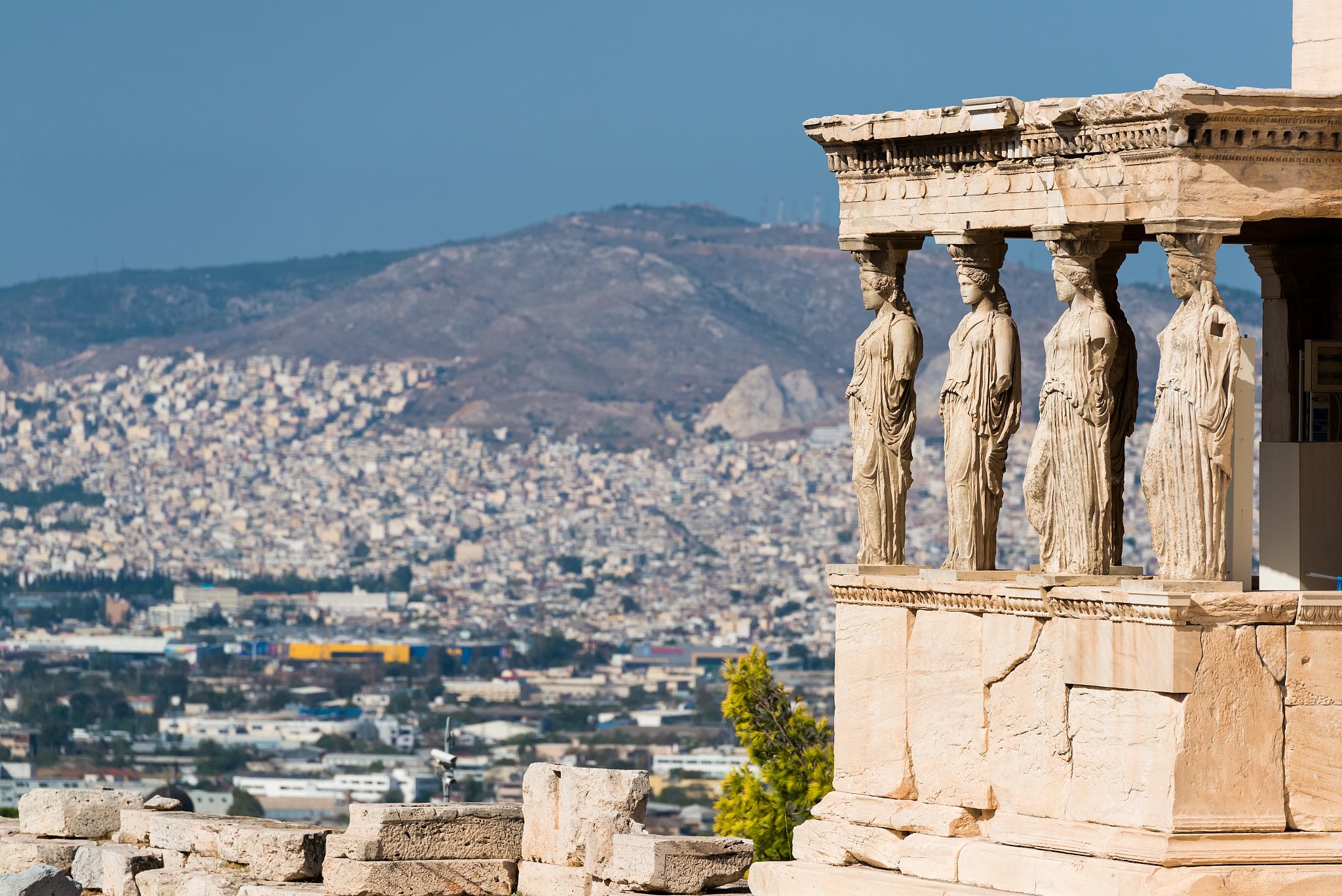 the porch of the caryatids in acropolis of athens