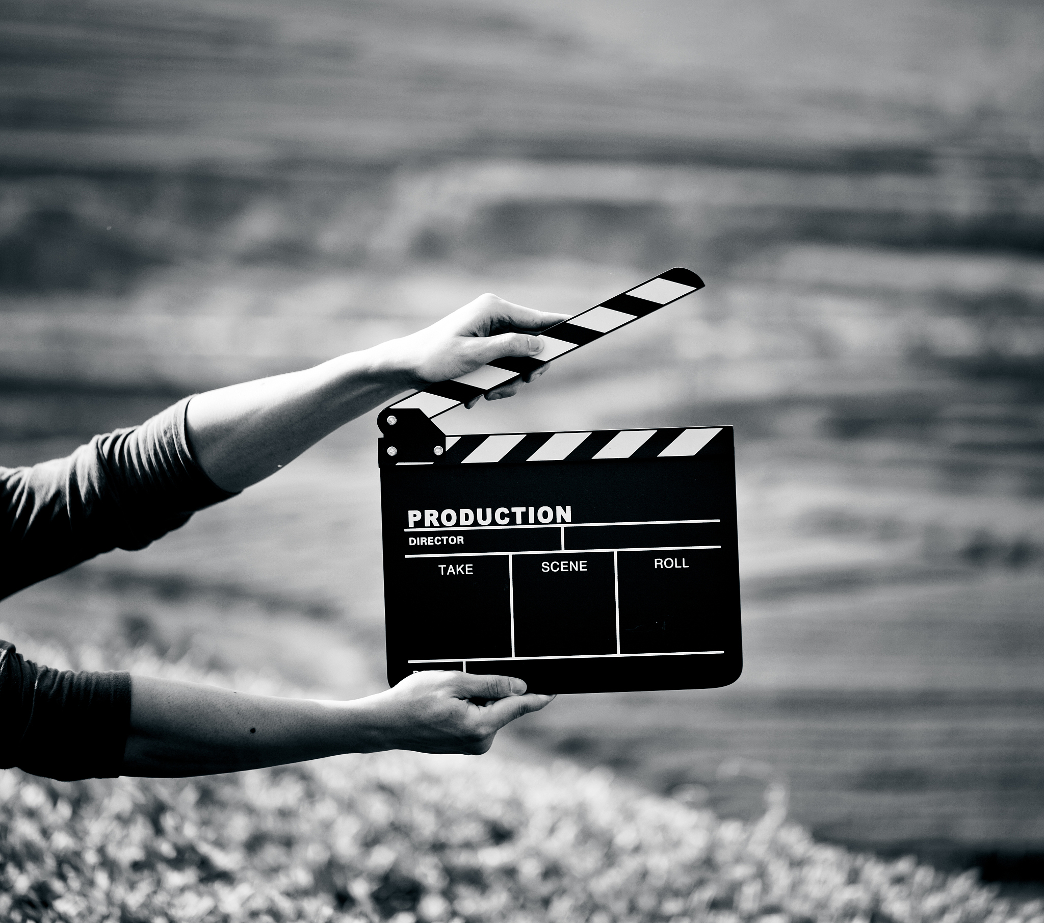 hands holding a movie clapboard