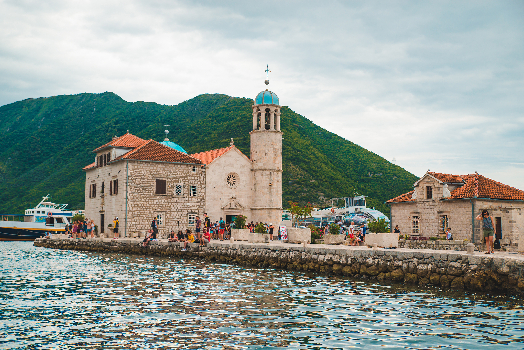 perast, montenegro - july 17, 2018: tourist at our lady island