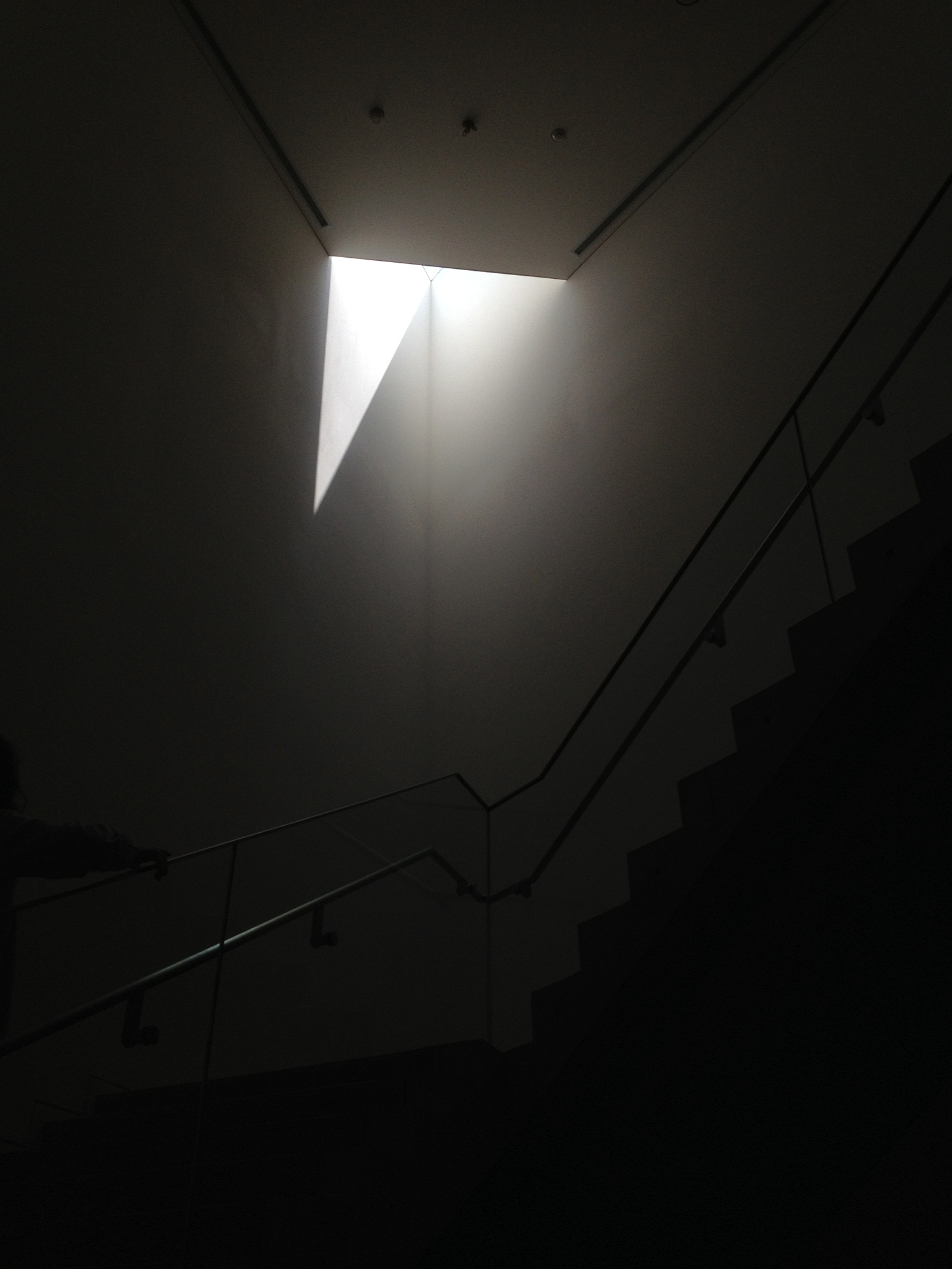 low angle view of sunlight falling on wall in building