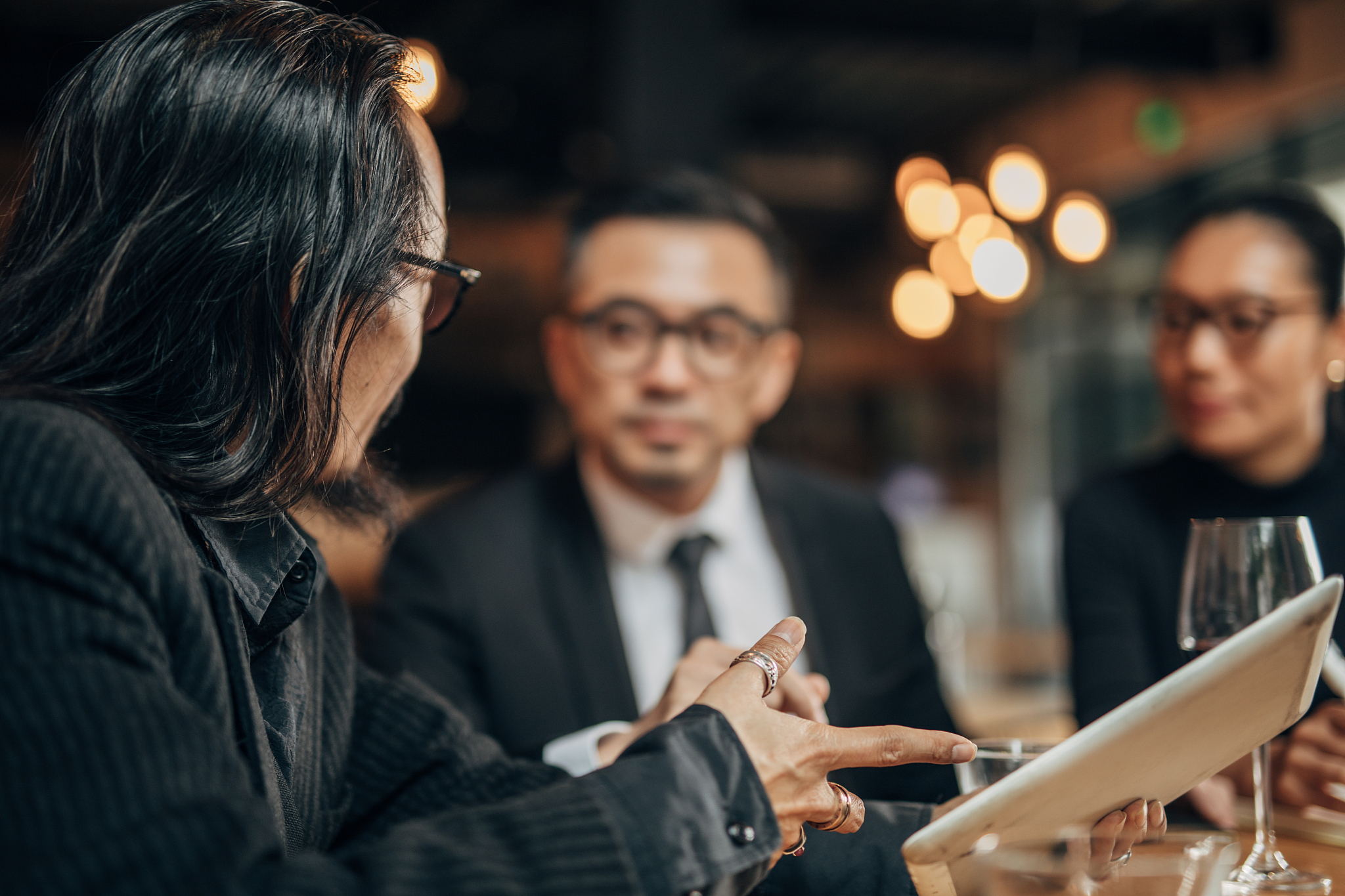 business people sitting in restaurant