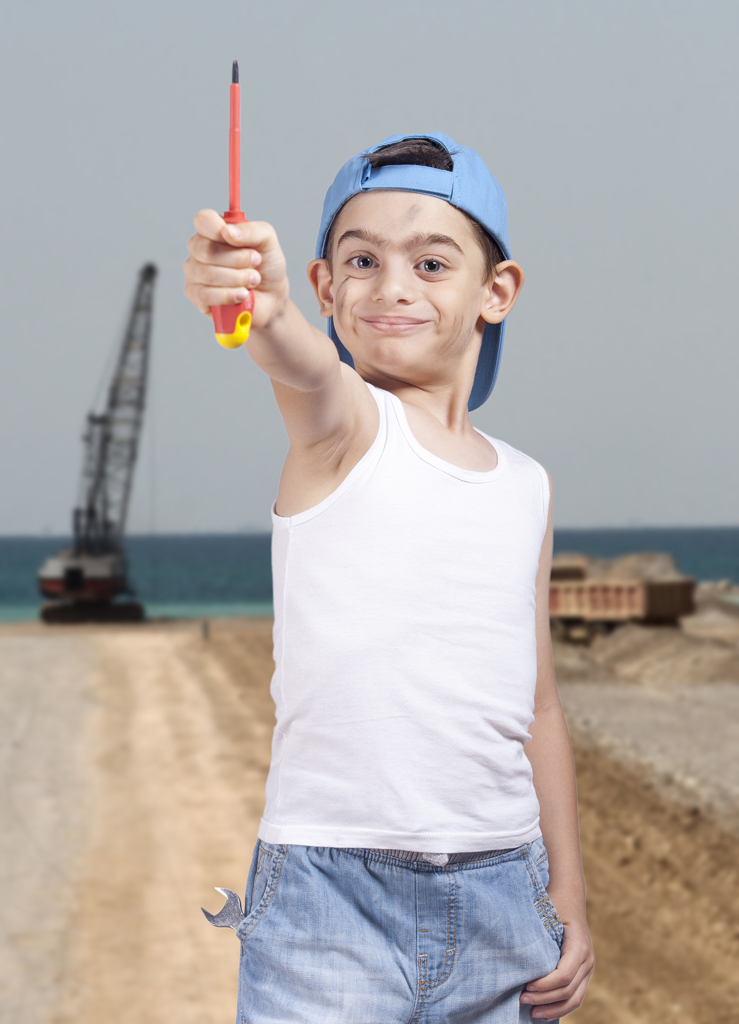 little construction worker on a construction site background