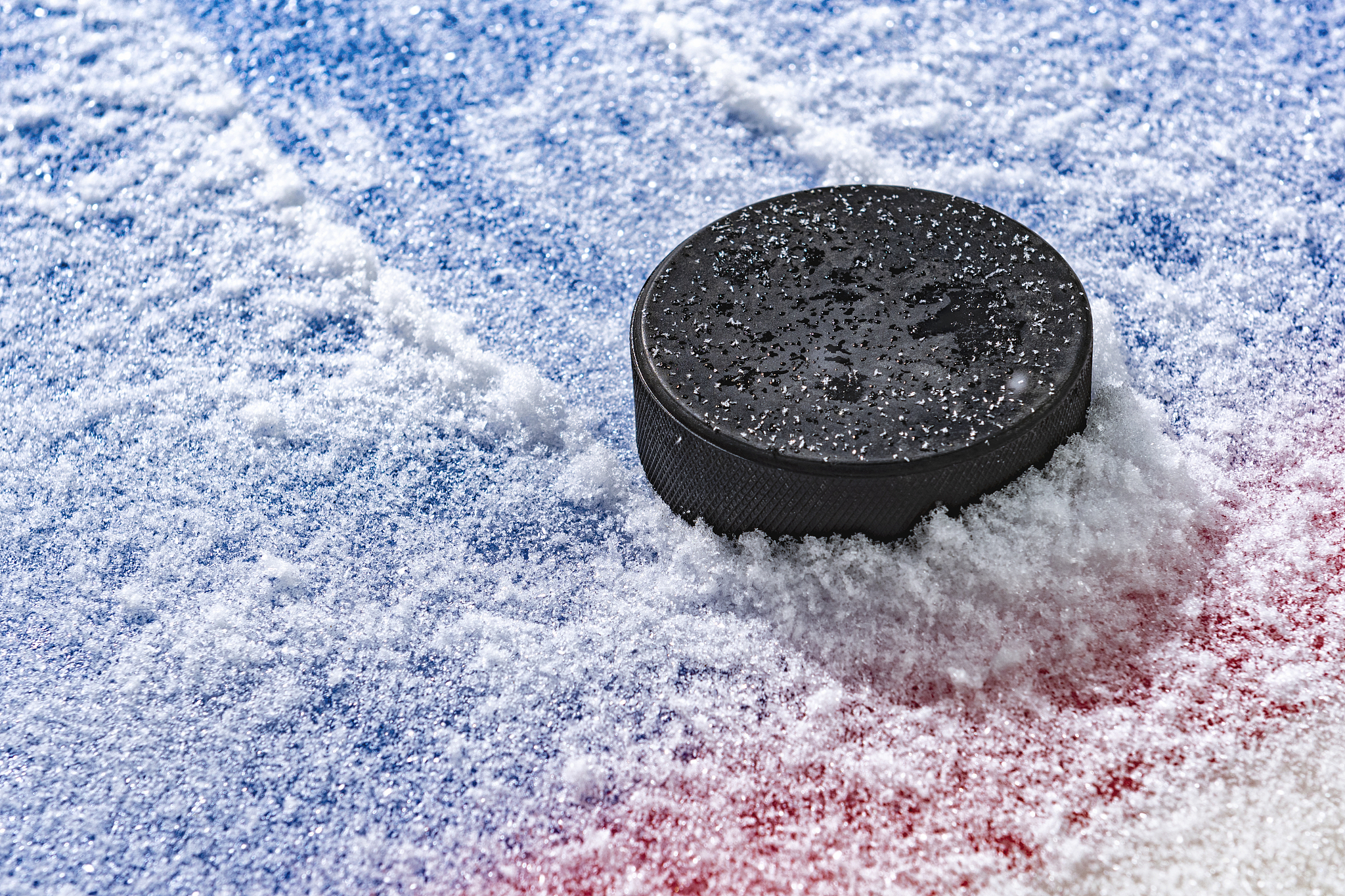 but when the puck is just sitting stilleven when itis in play it is not considered a goal until it crosses the goal line and completely passes the goal line This means that if the puck is sitting on t