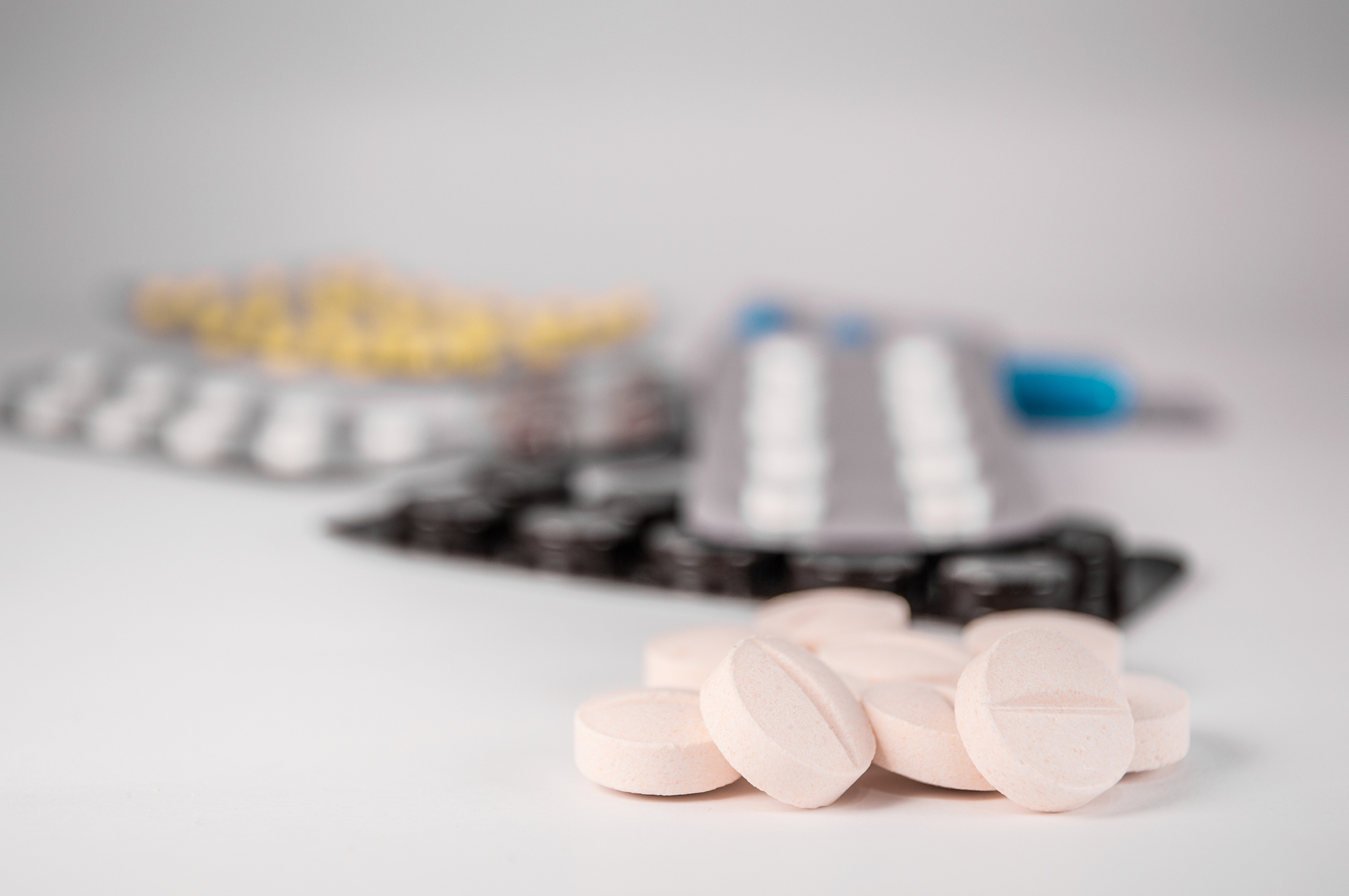 white medical pills and tablets