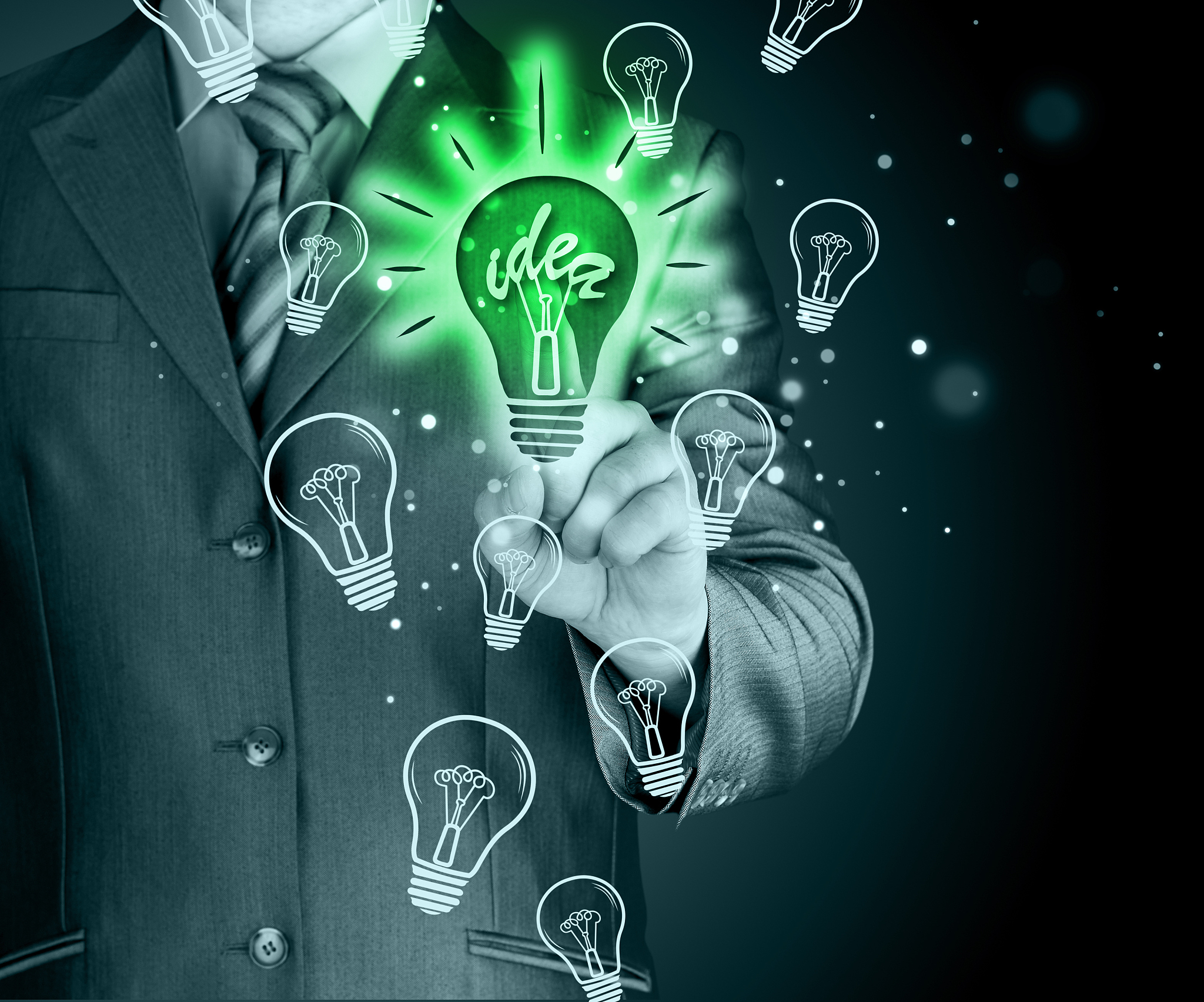 business man touching light of idea