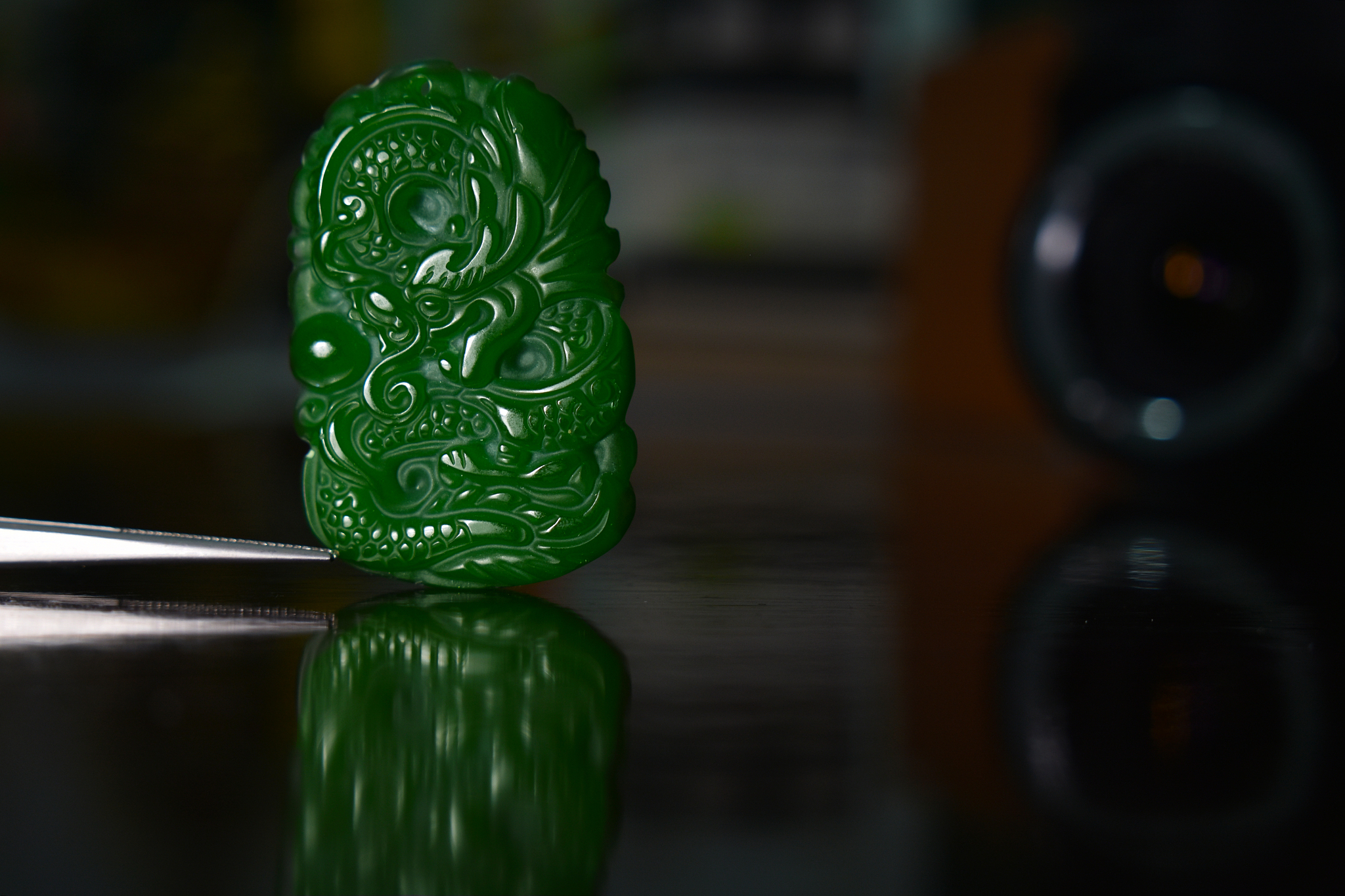 jade carving it is a green dragon.