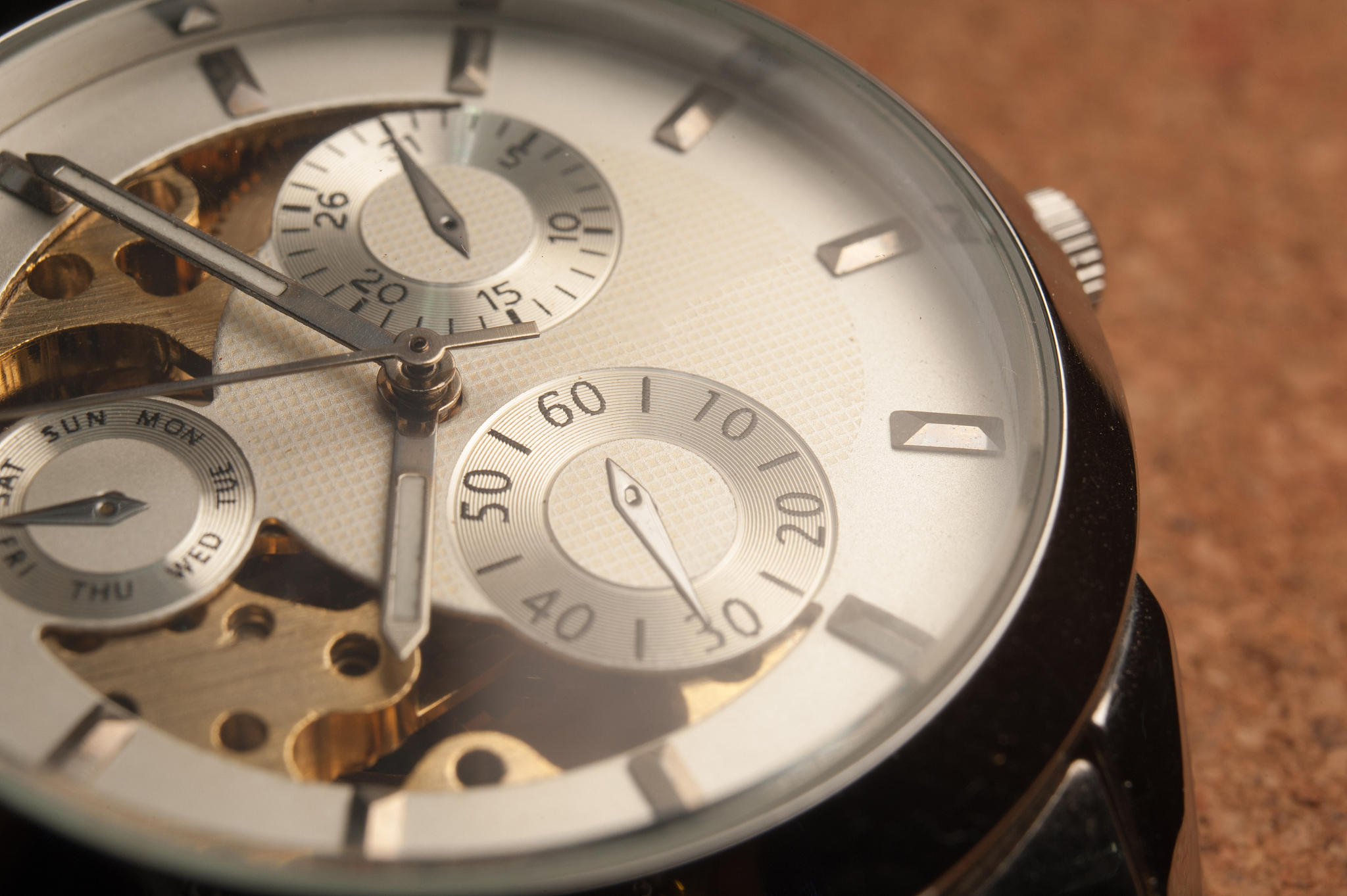 detail of watch machinery on the table.