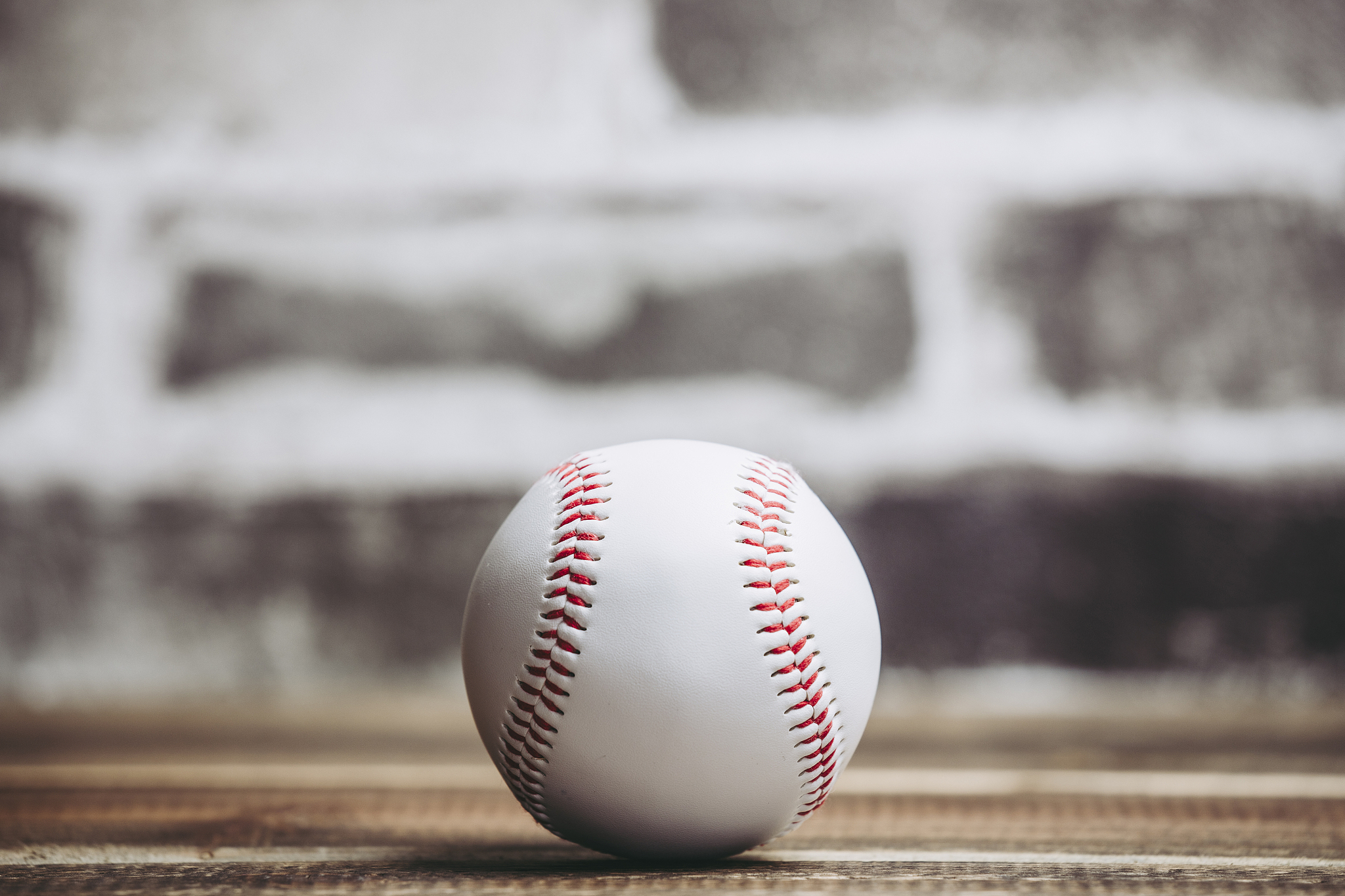 baseball ball and brick background