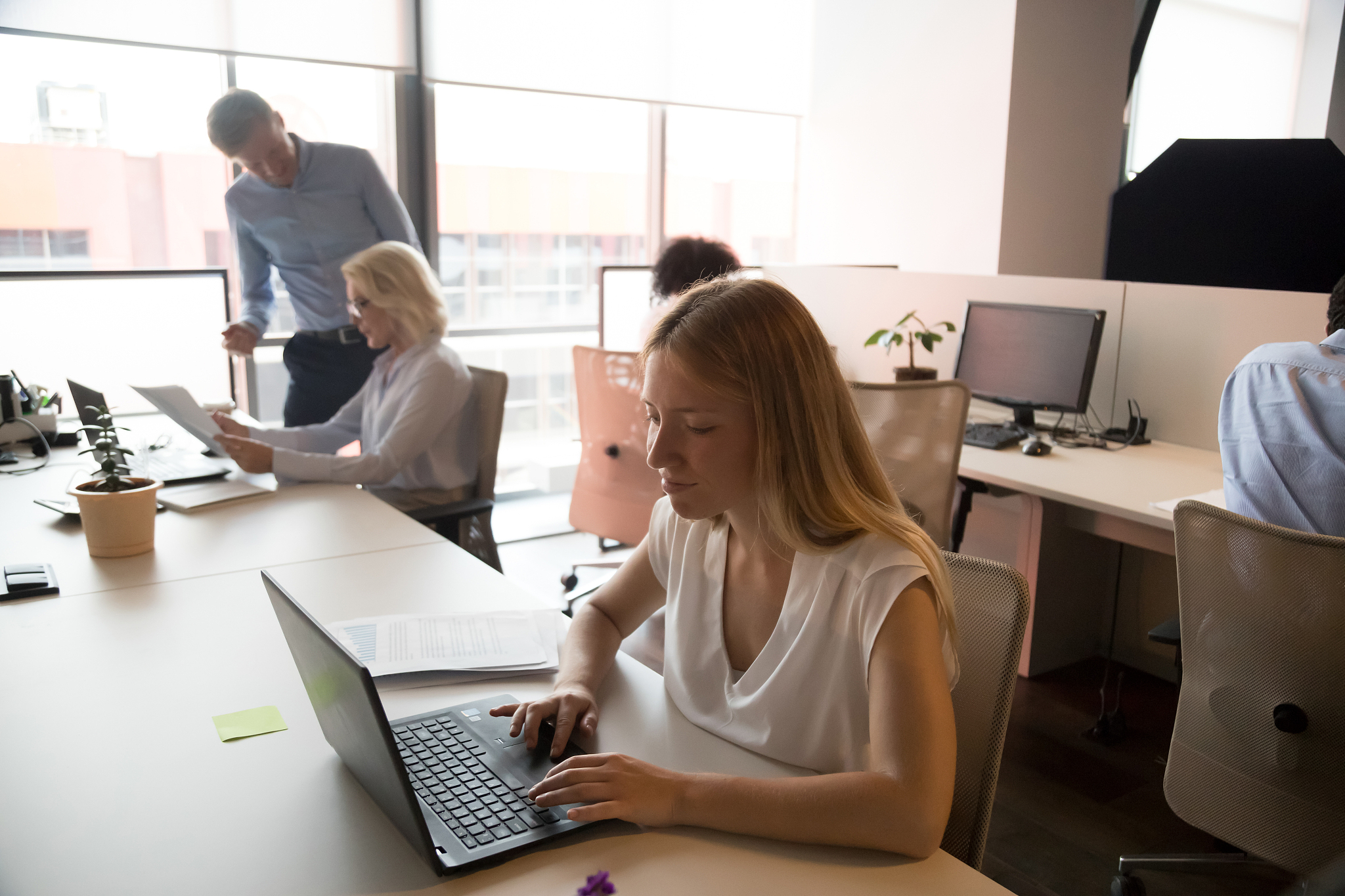 business people working in modern office, using computers, busy 