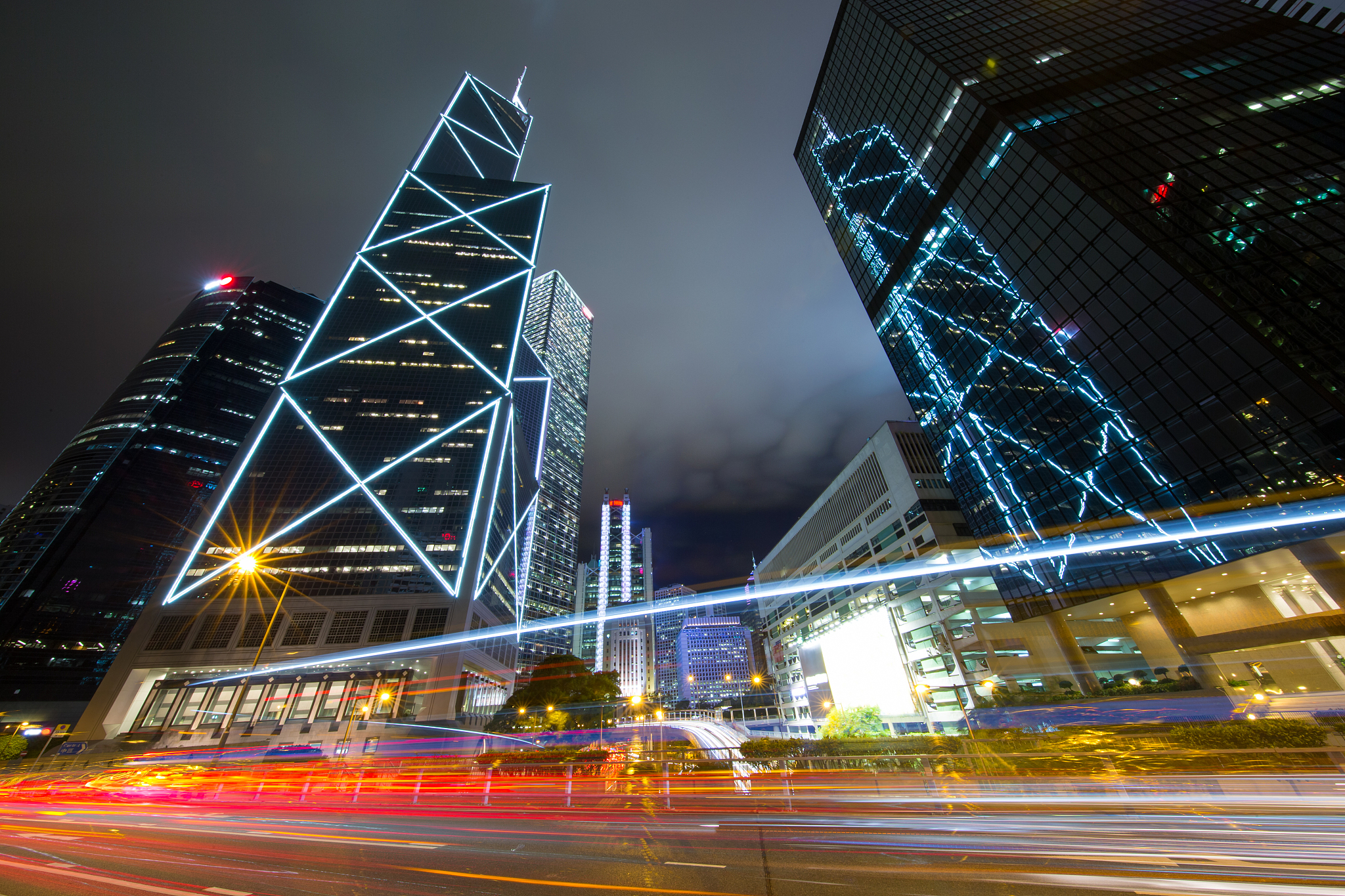 hong kong business district at night & light track