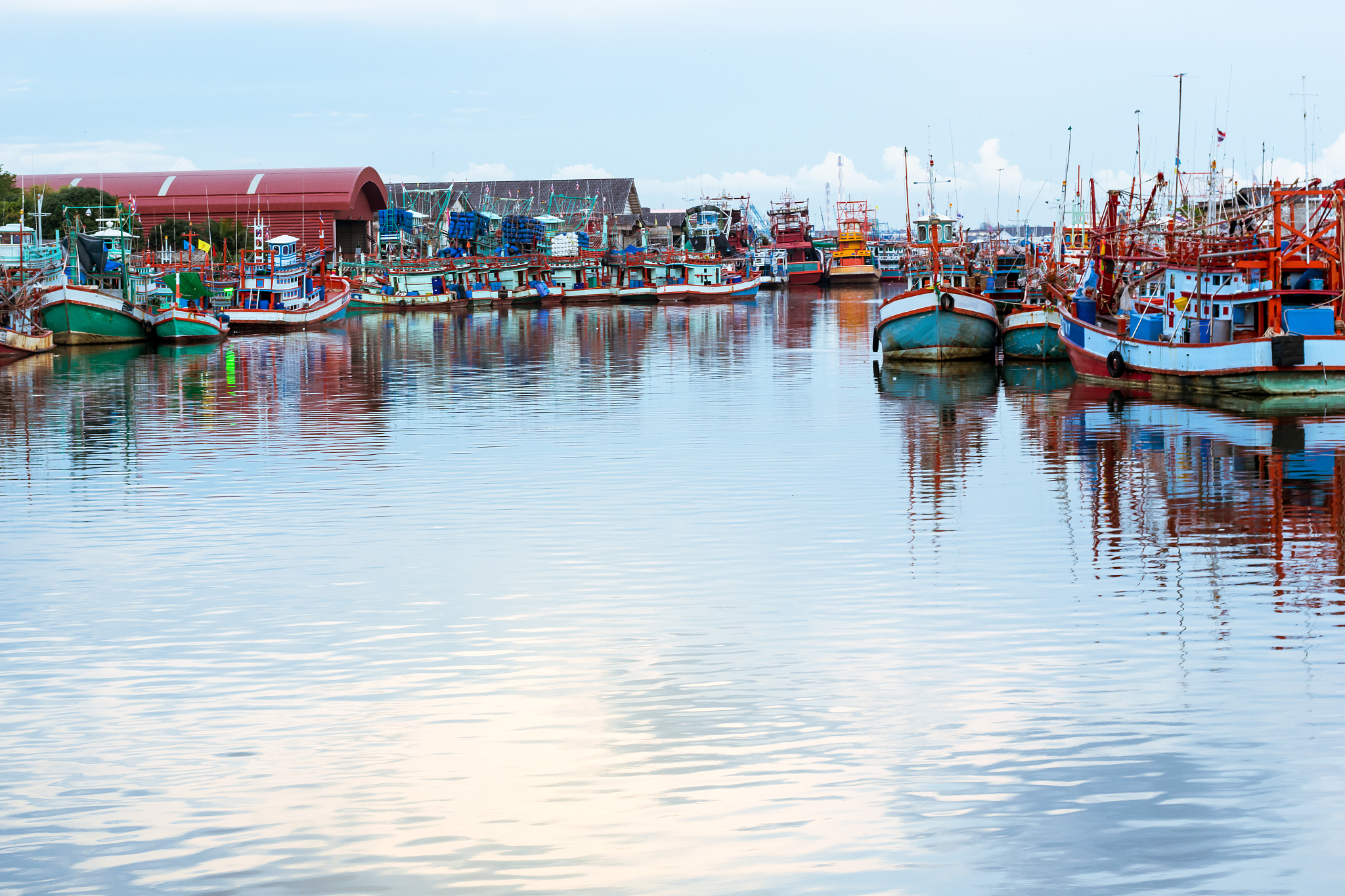 small fishing boats port on river.