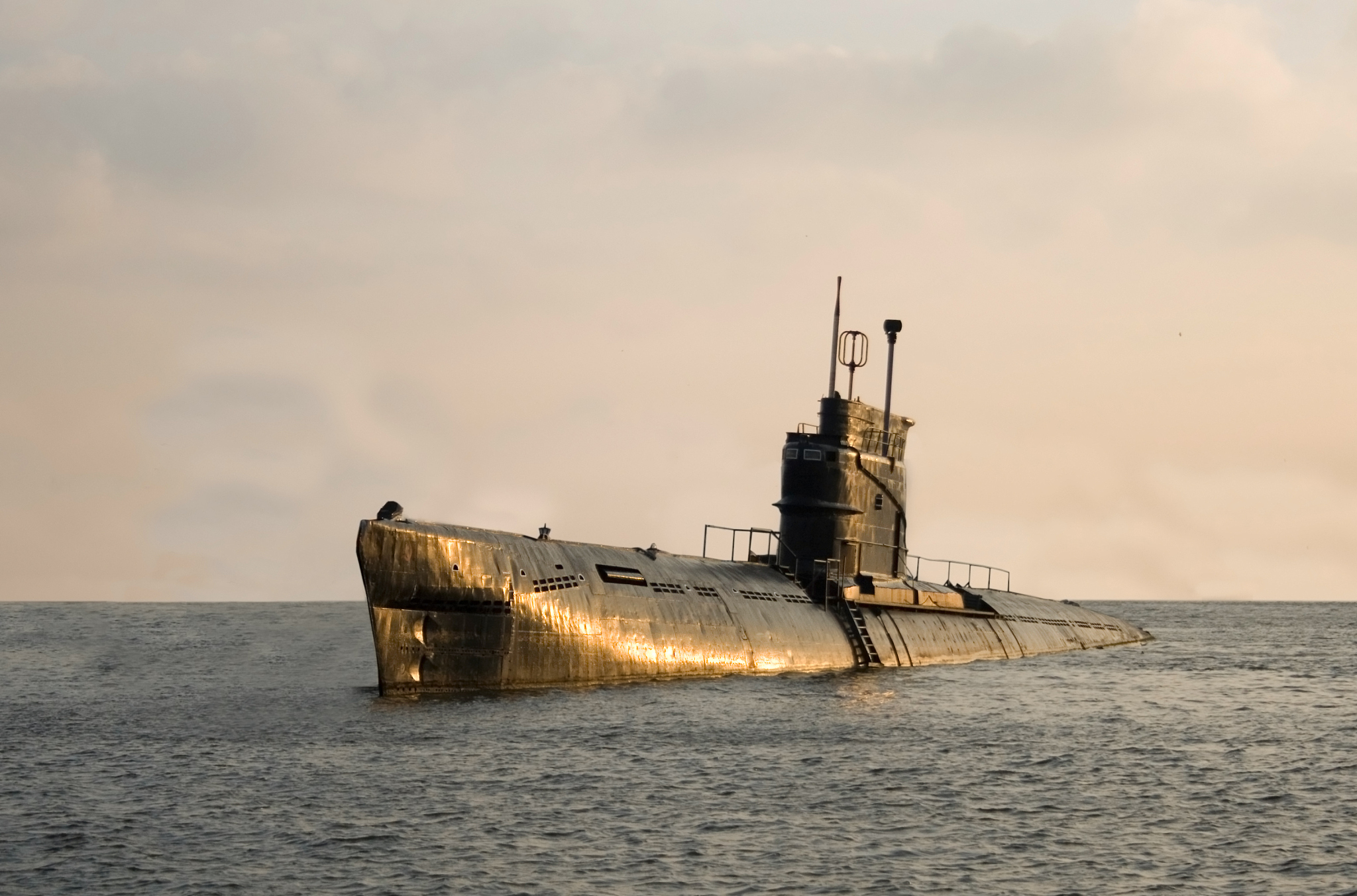 russian submarine that's just barely above the surface