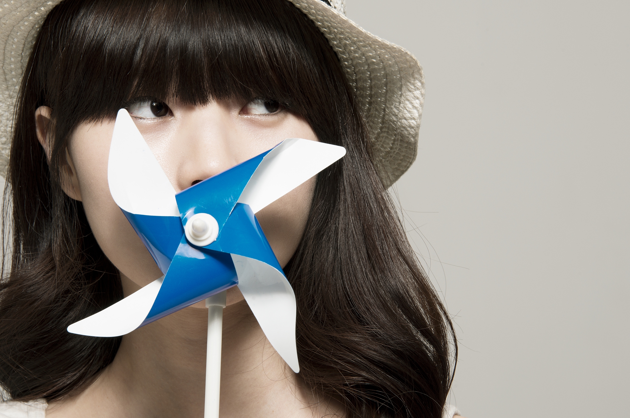 young woman with pinwheel