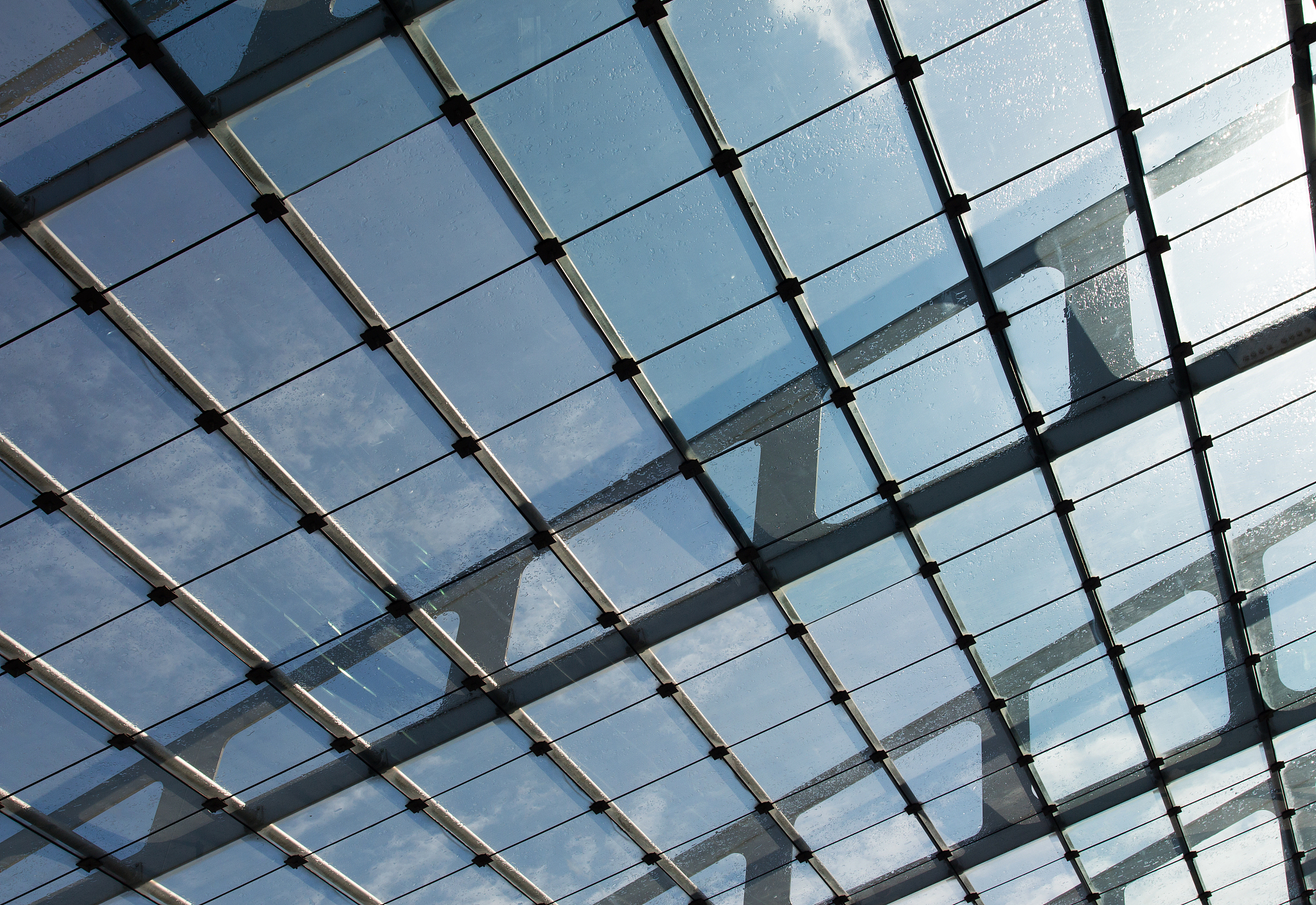 the glass roof of station in  sunlight