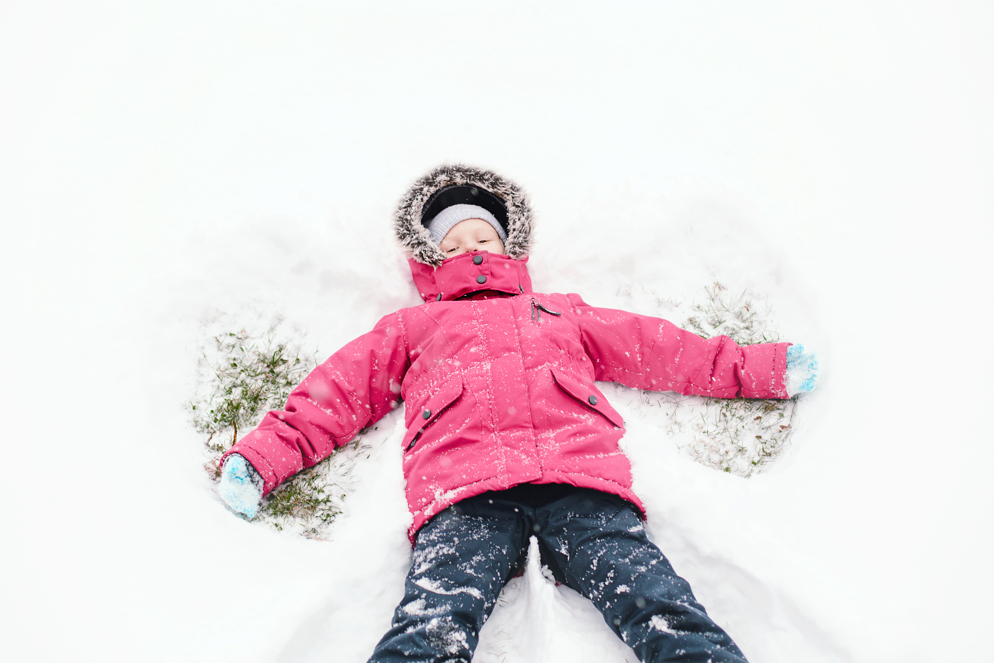 cute adorable funny caucasian girl child in warm clothes pink ja