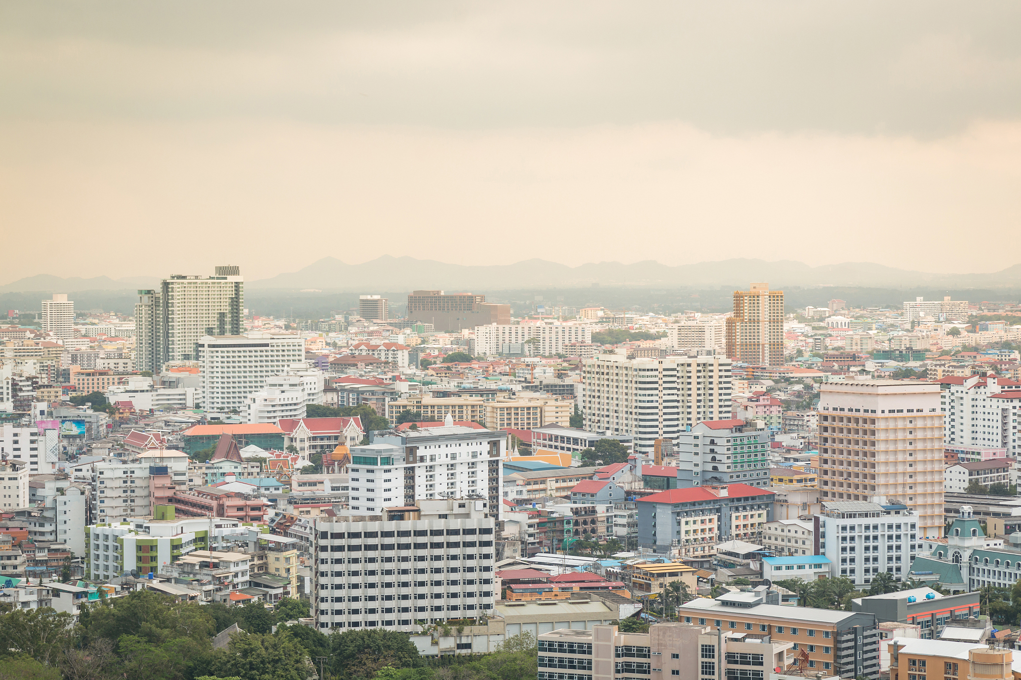 building cityscape at daytime. pattaya city, thailand. (vintage 