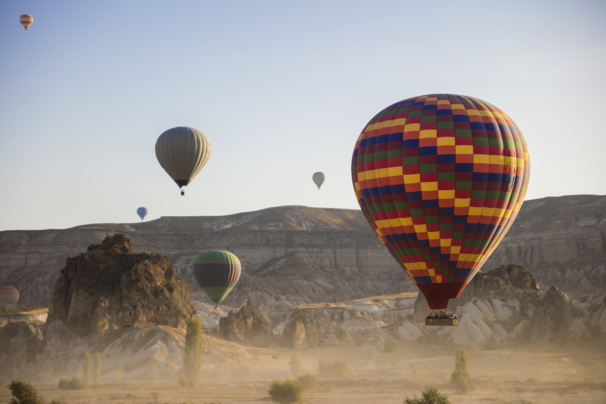 hot air balloons flying sn the morning, cappadocia, turkey