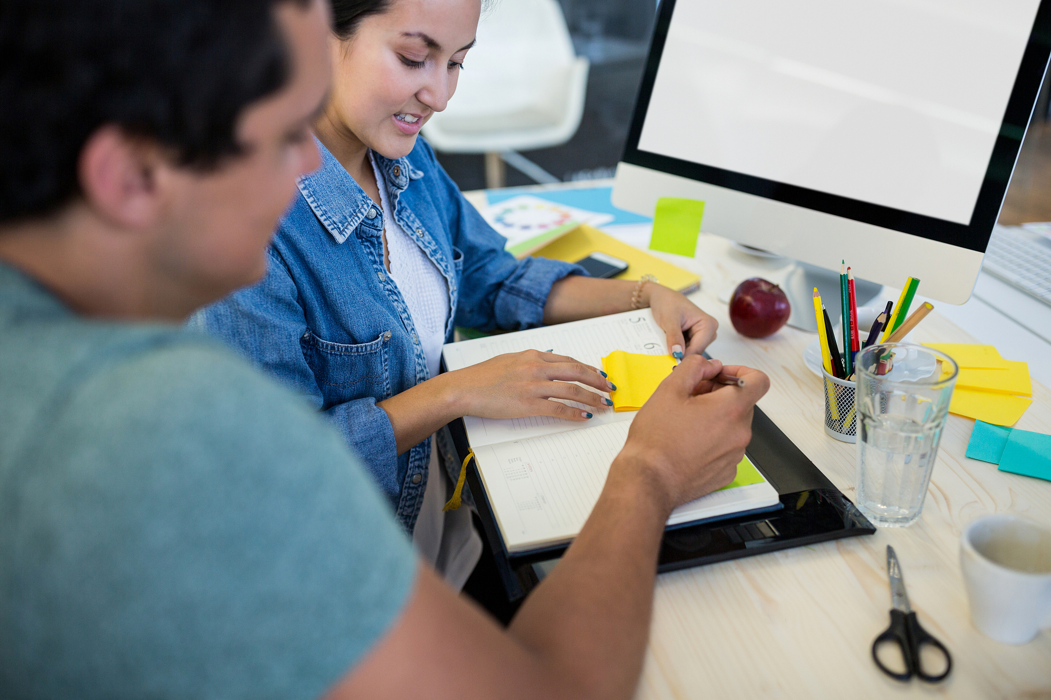 graphic designers working at desk