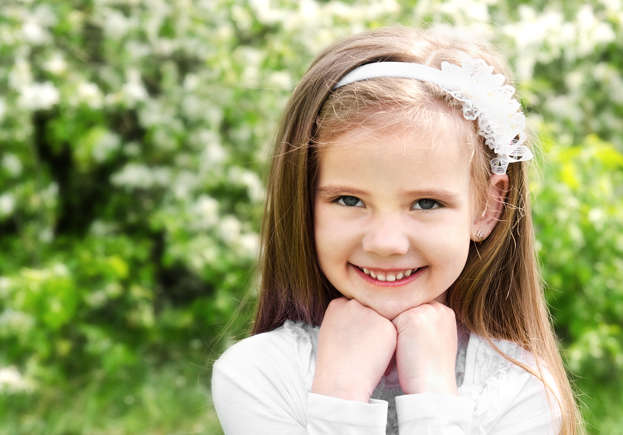 portrait of adorable smiling little girl