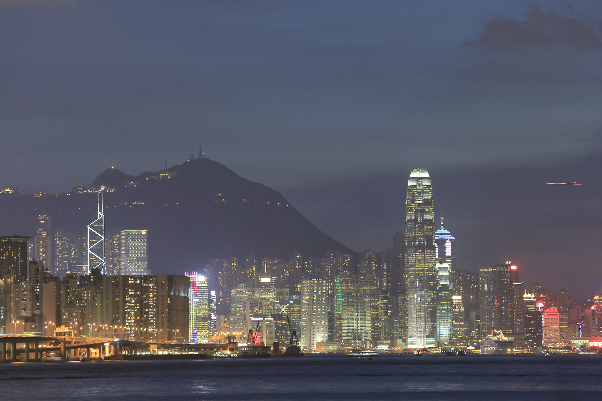 victoria harbor of hong kong city at dusk 2014