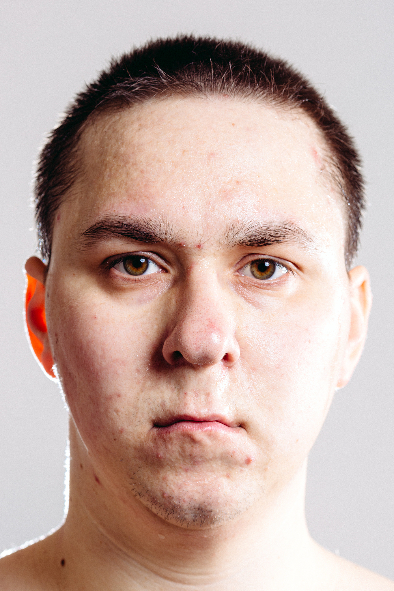 macho tough guy close up studio portrait