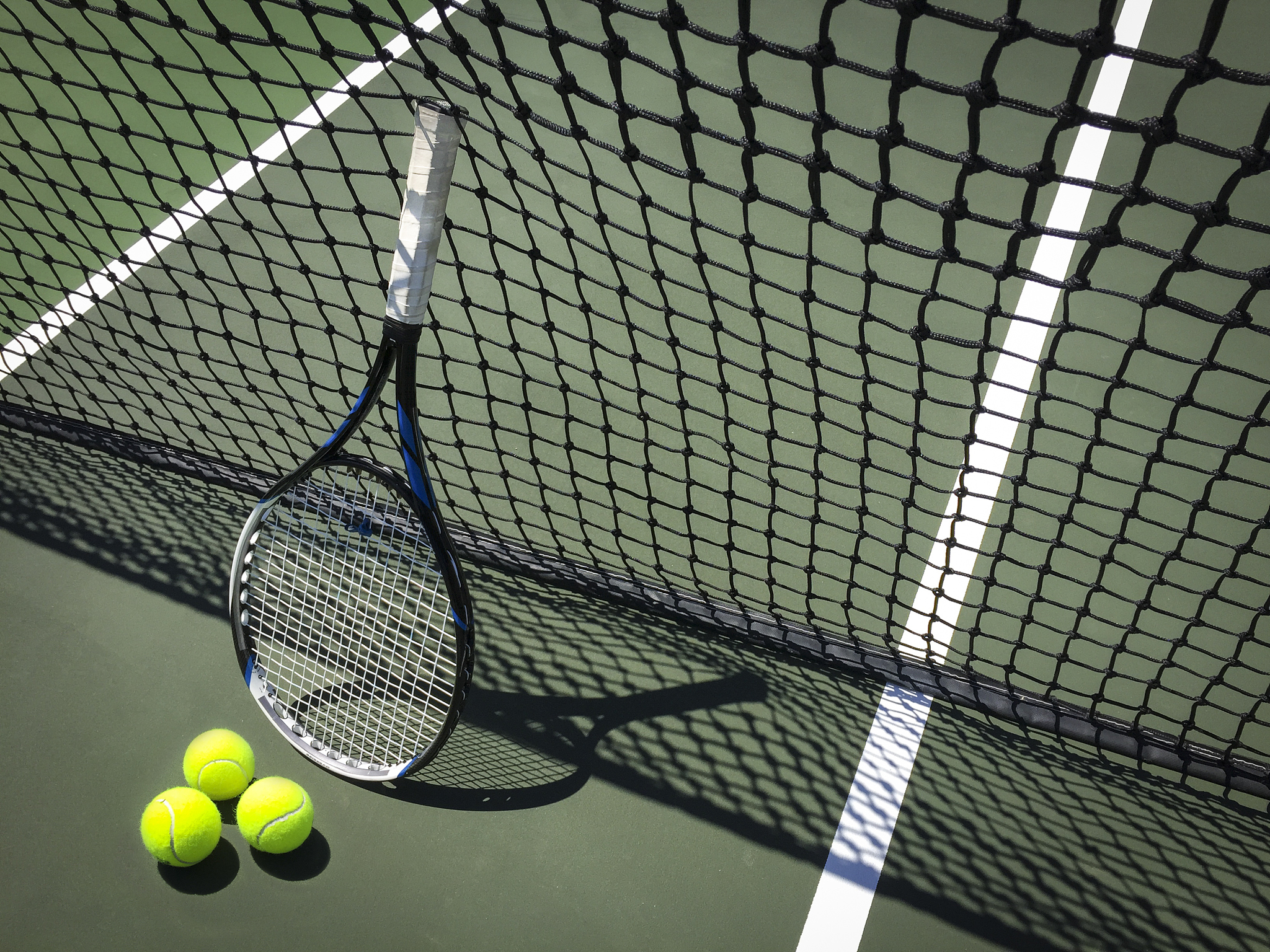 Top 10 Low Launch Angle Tennis Strings for Control & Spin