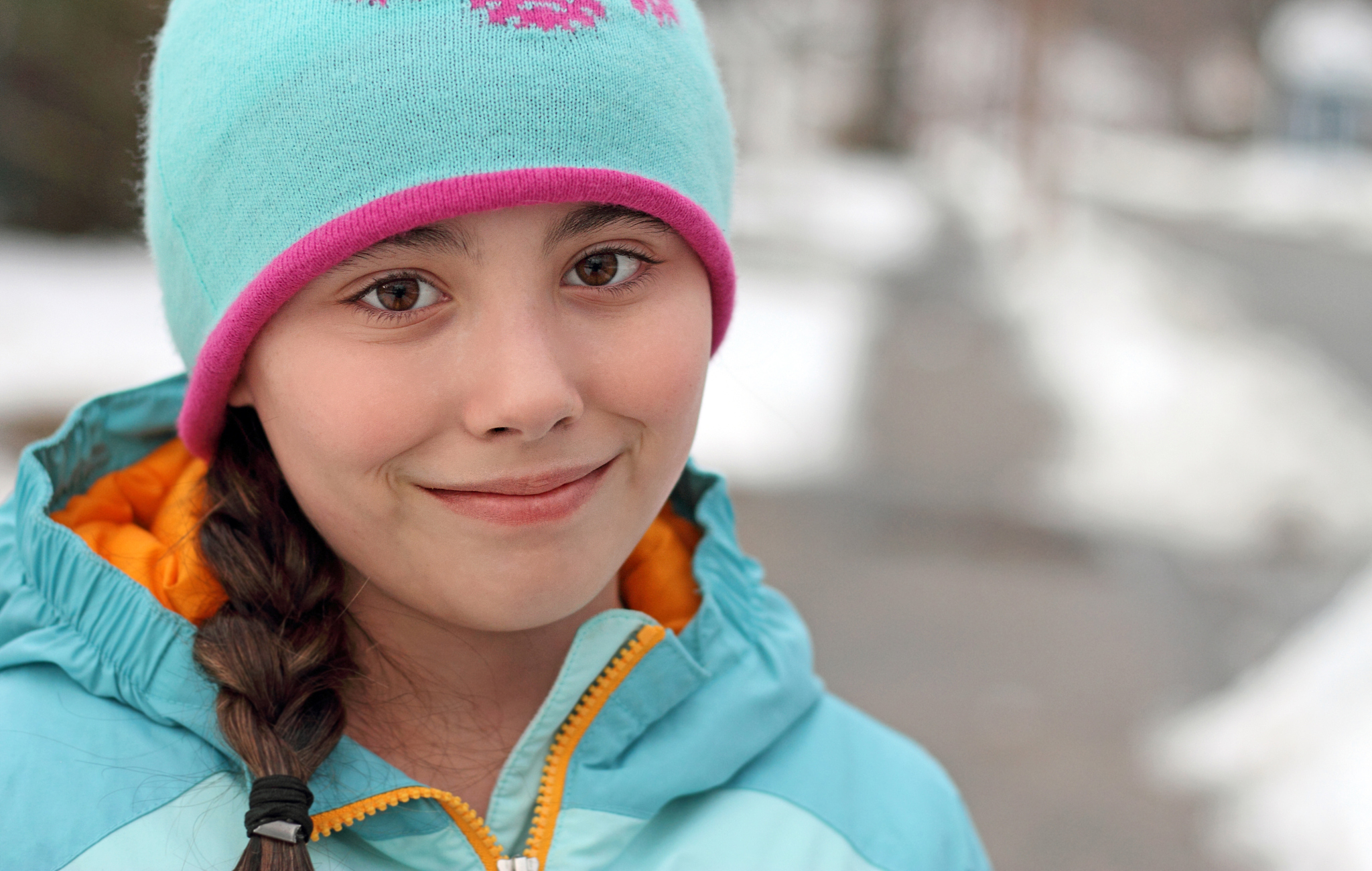 cute child outside with sidewalk in background