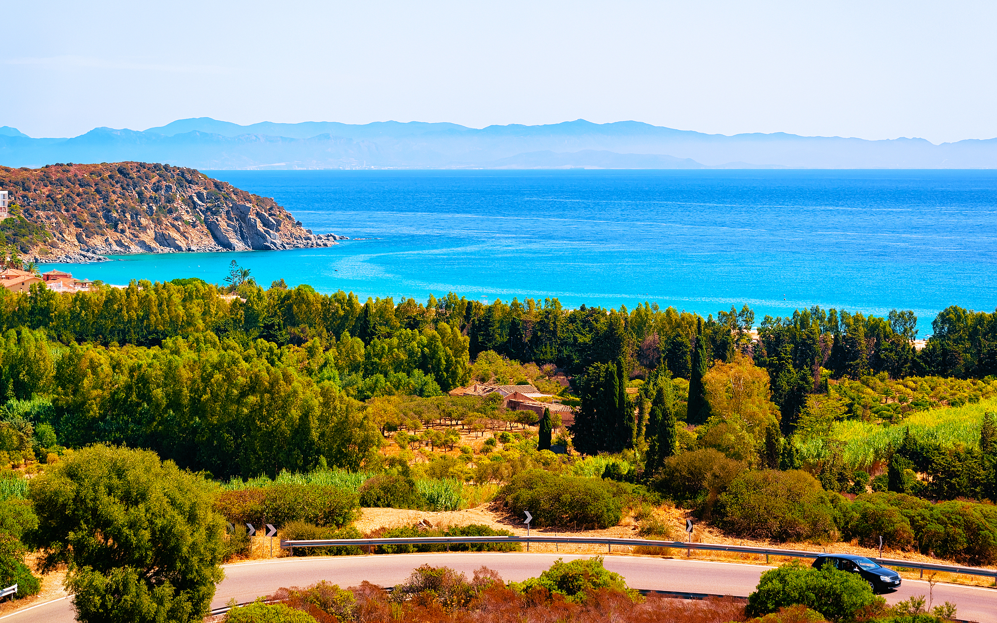 scenery with car on road at mediterranean sea in villasimius ref