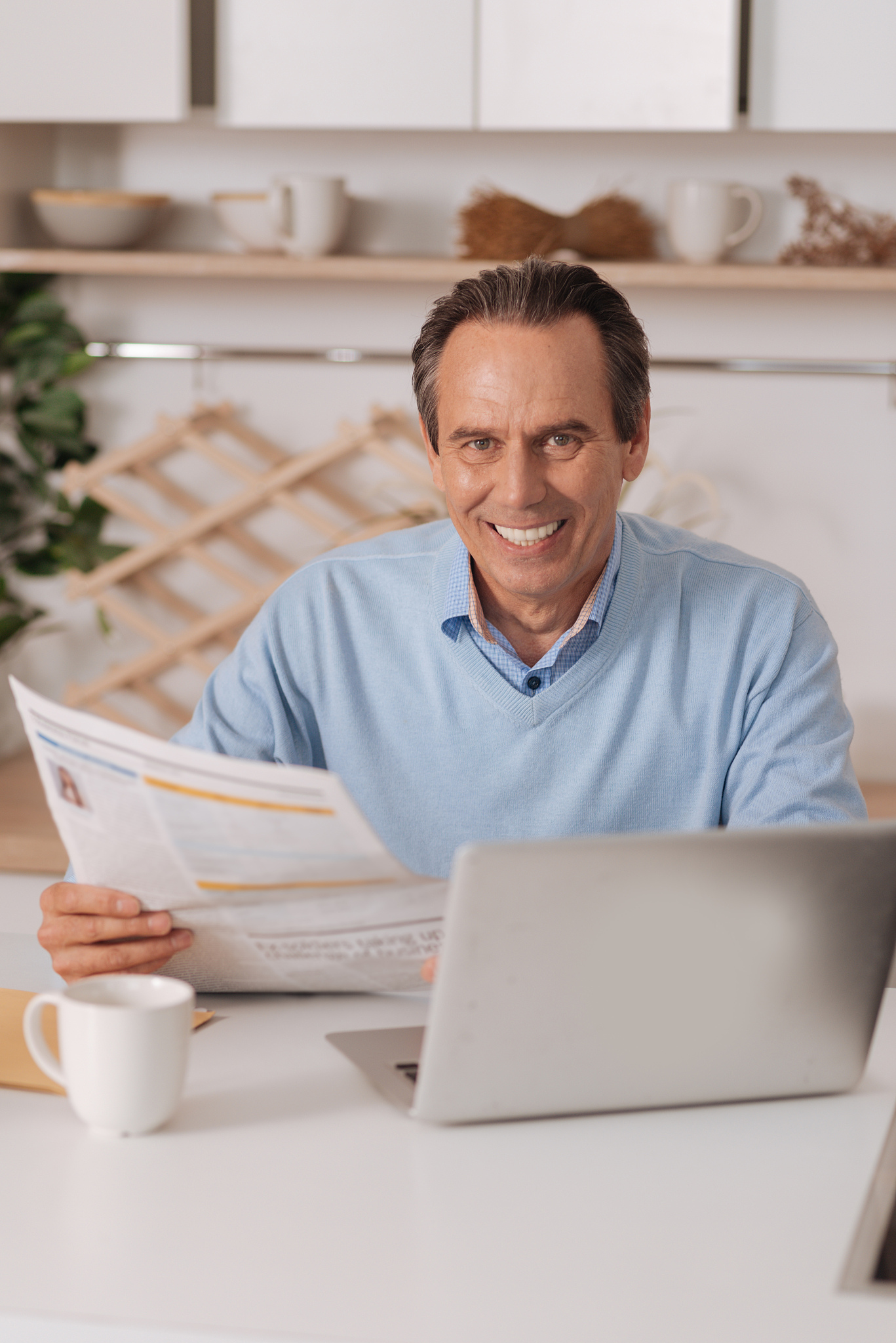 delightful old man enjoying morning routine at home