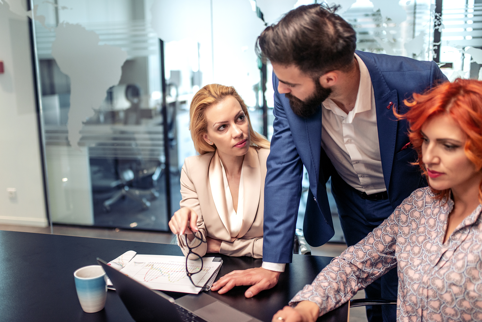 business people are using laptop and working together