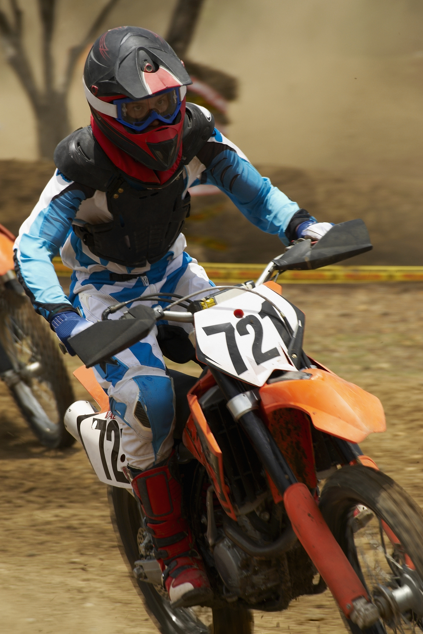 motocross rider riding a motorcycle