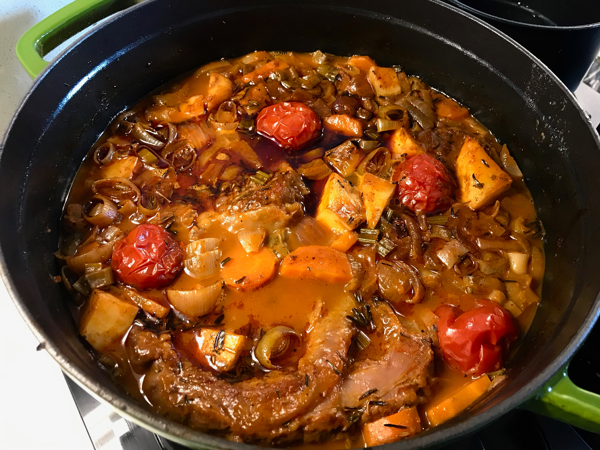 osso buco stew, veal shanks that are braised in wine with casser