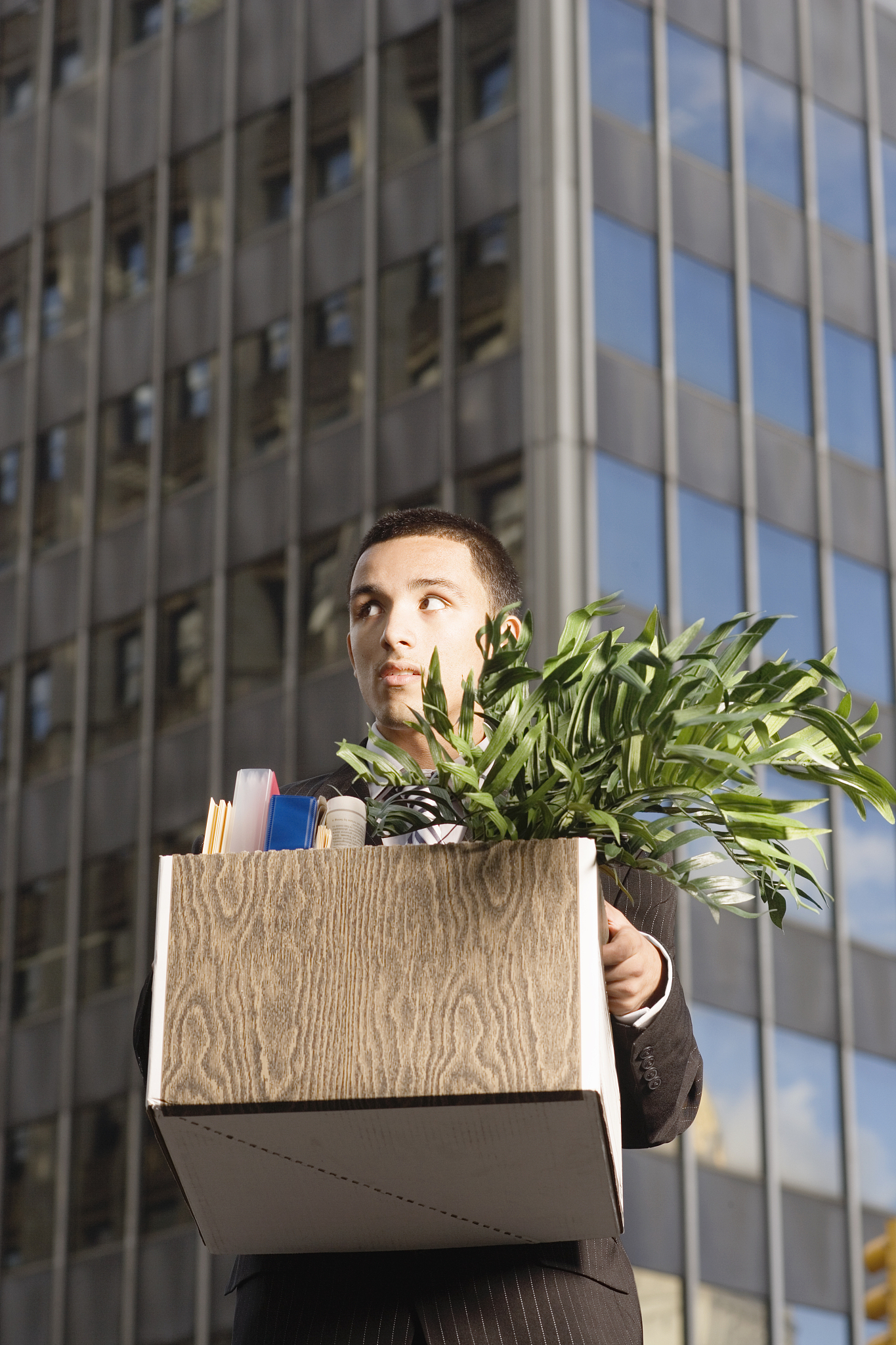 businessman holding box