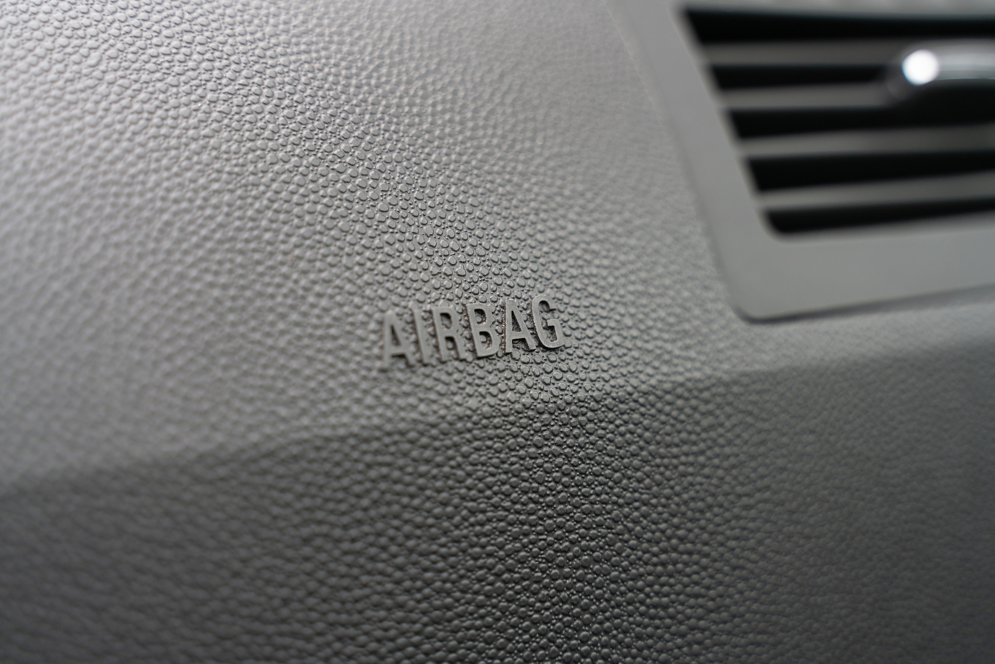 inscription on the panel of the vehicle airbag. background of gr