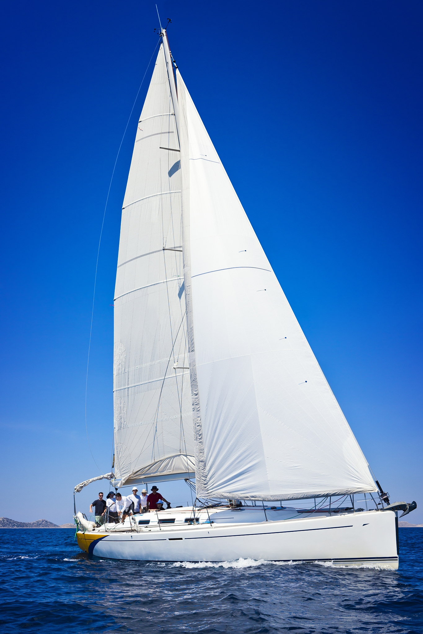 sailing crew on sailboat