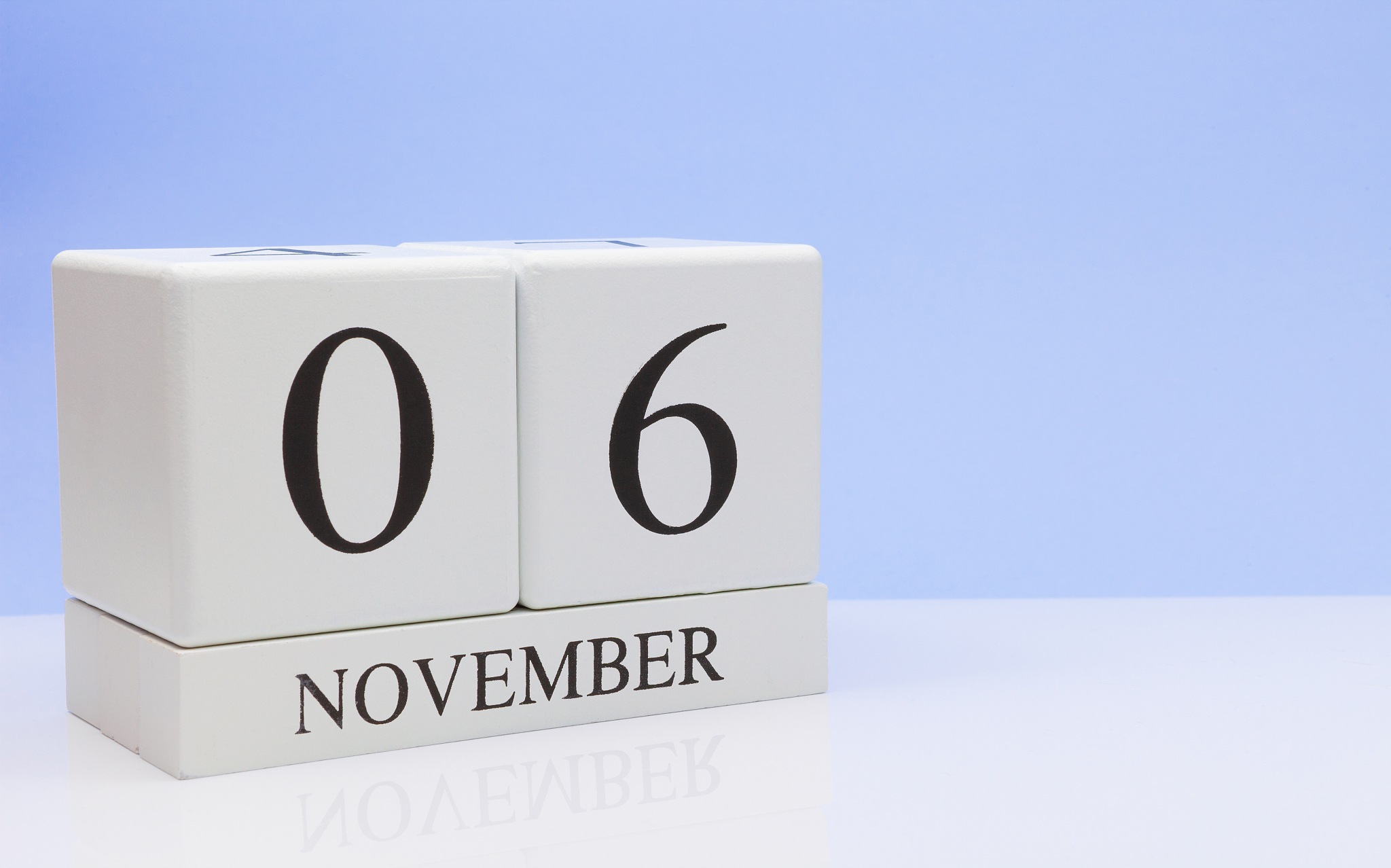 close-up of calendar against blue background