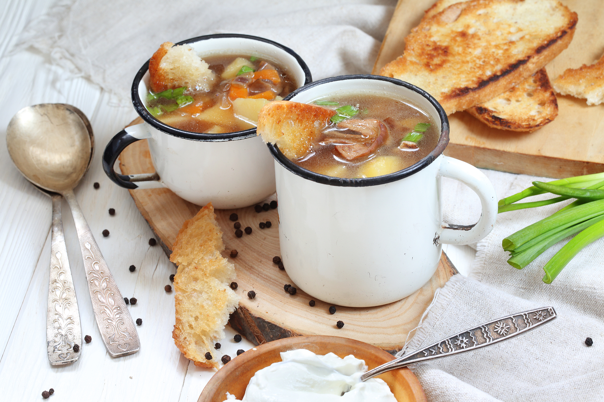 mushroom soup on white wooden table