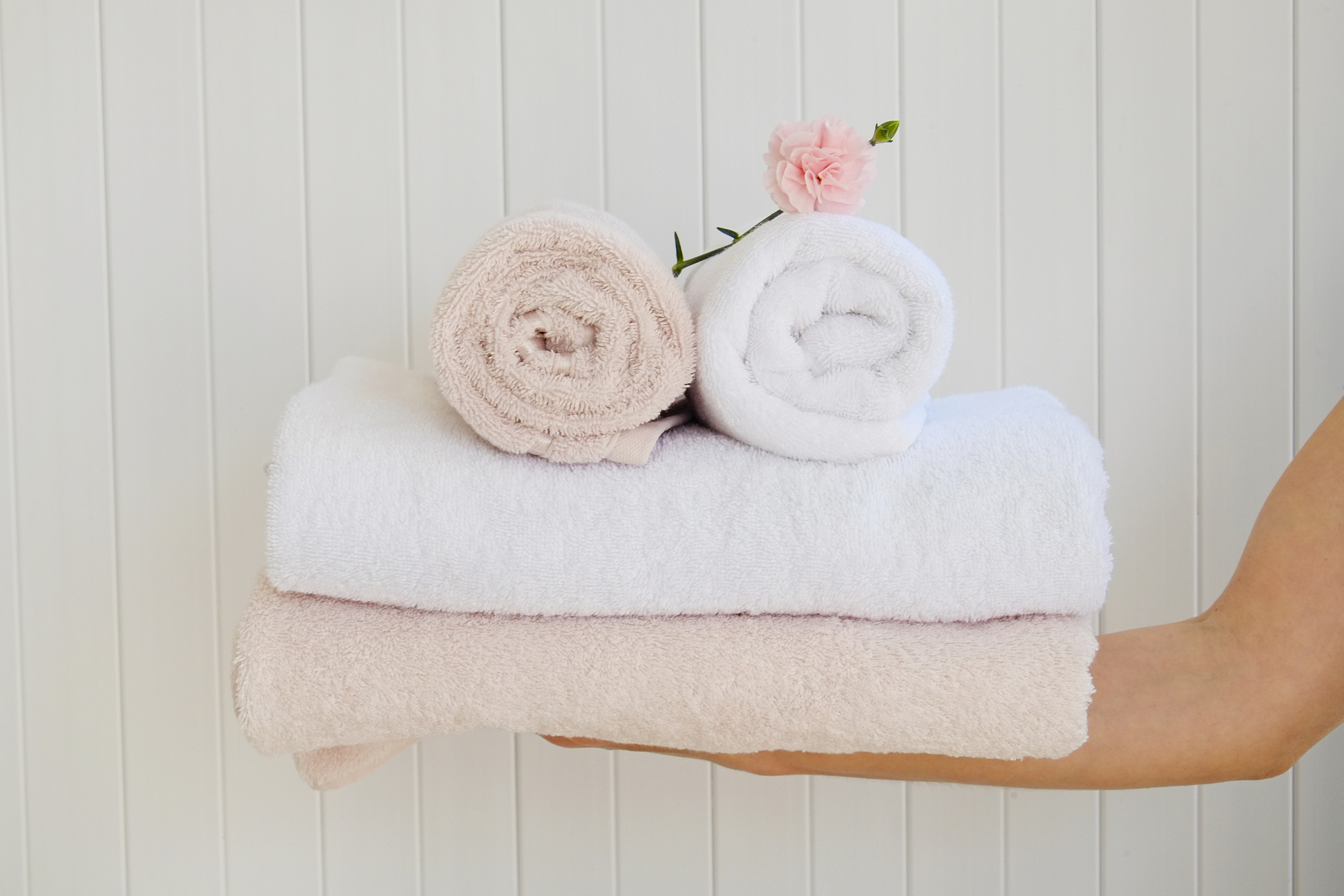 close up shot of freshly laundered bath accessories of different