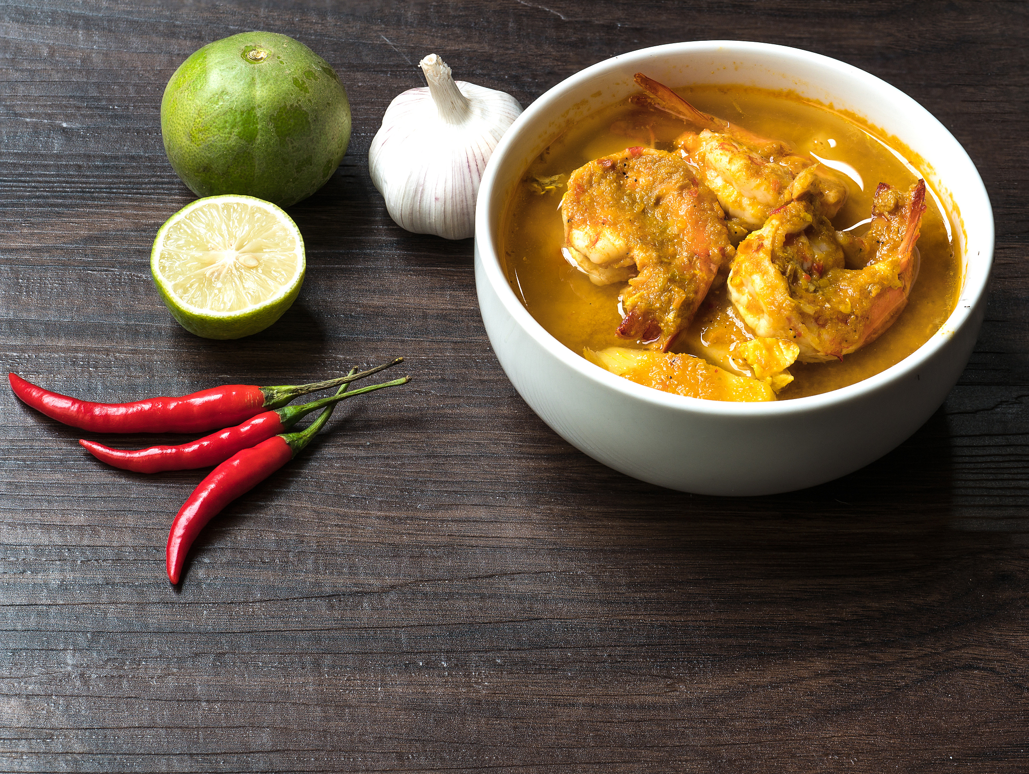 yellow curry with shrimp and coconut shoots, a bowl of thai food